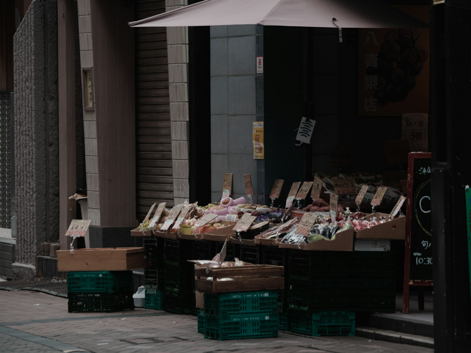 Street vegetable market stall with an umbrella