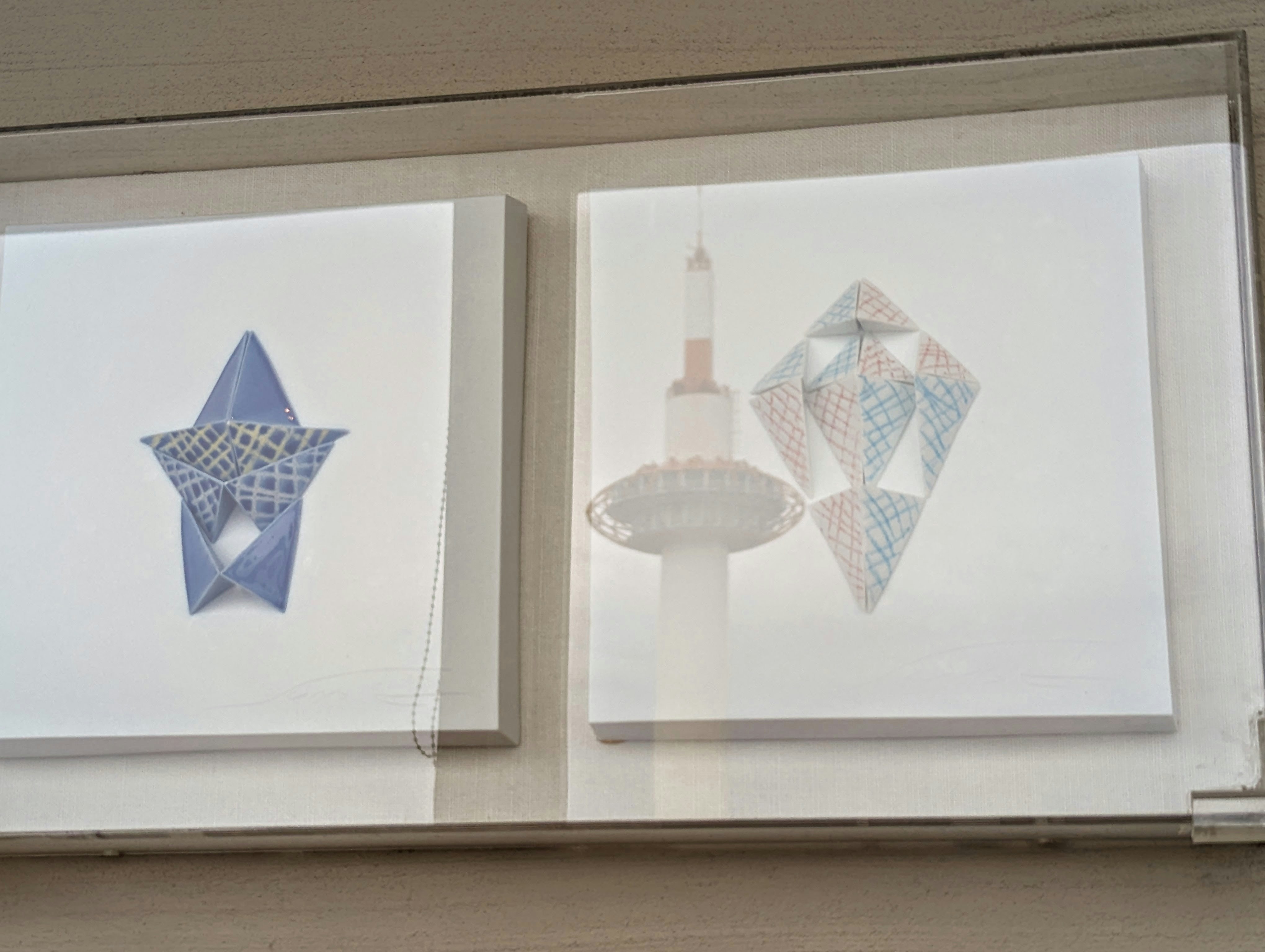 geometric artwork displayed on a wall