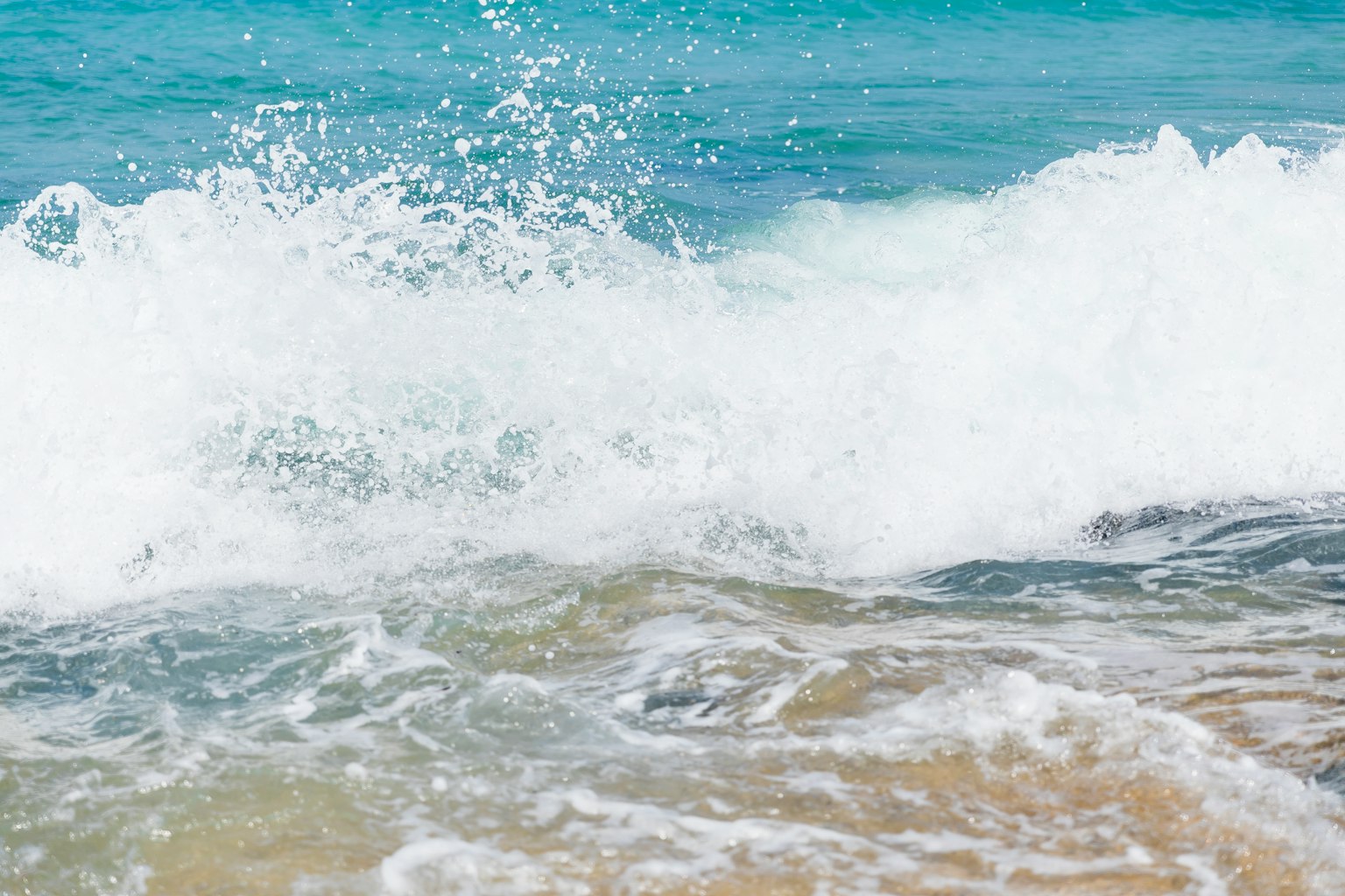 Scene of ocean waves crashing with white foam