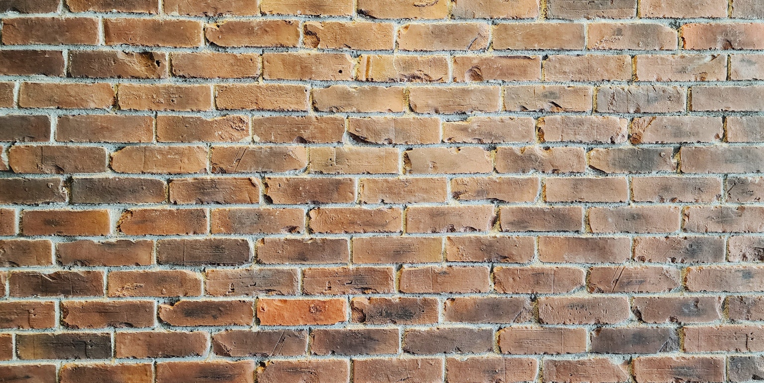 Tường gạch đỏ nâu có kết cấu