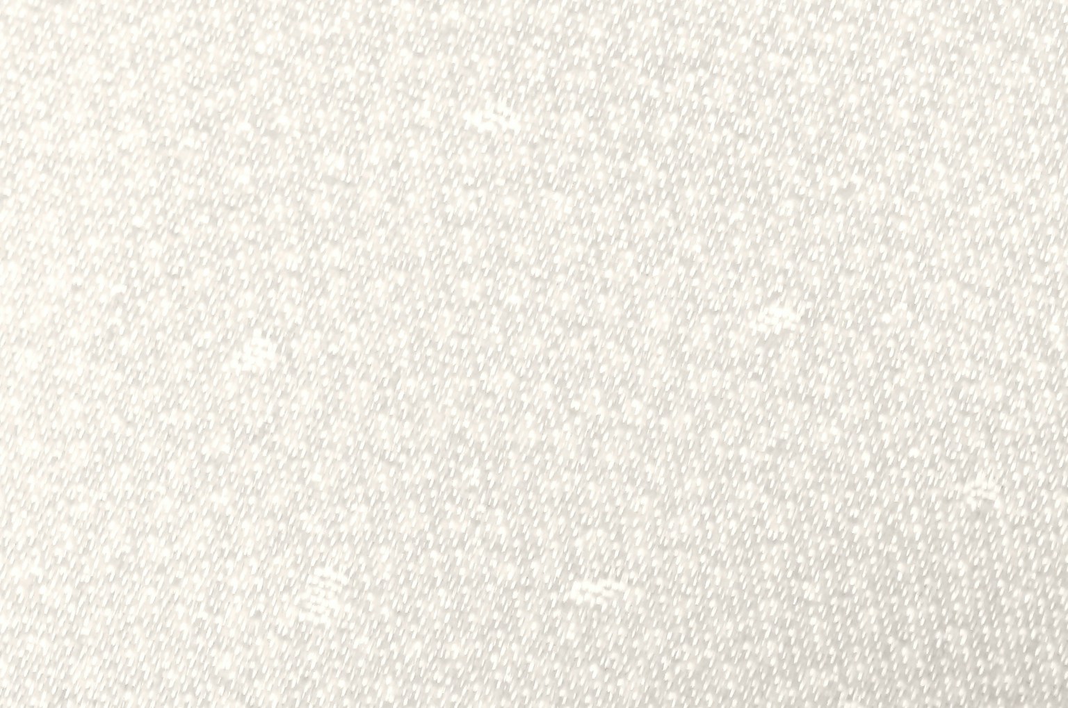 Close-up of white knitted fabric texture