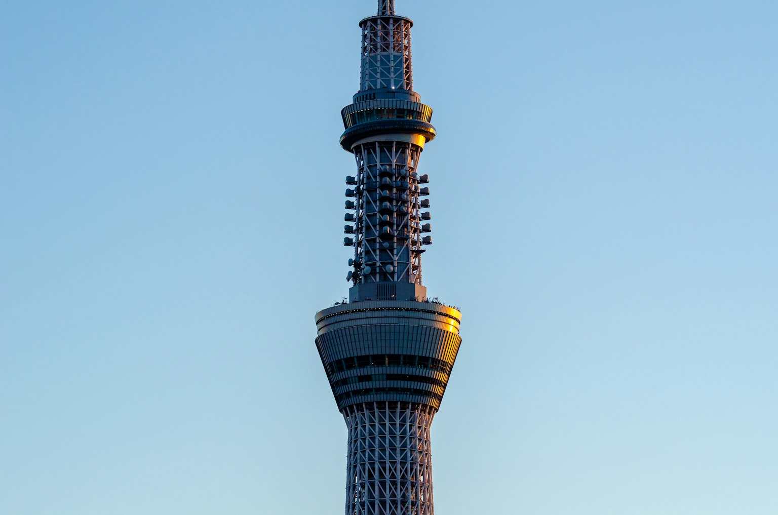Detailed image of Tokyo Skytree tall tower against a blue sky