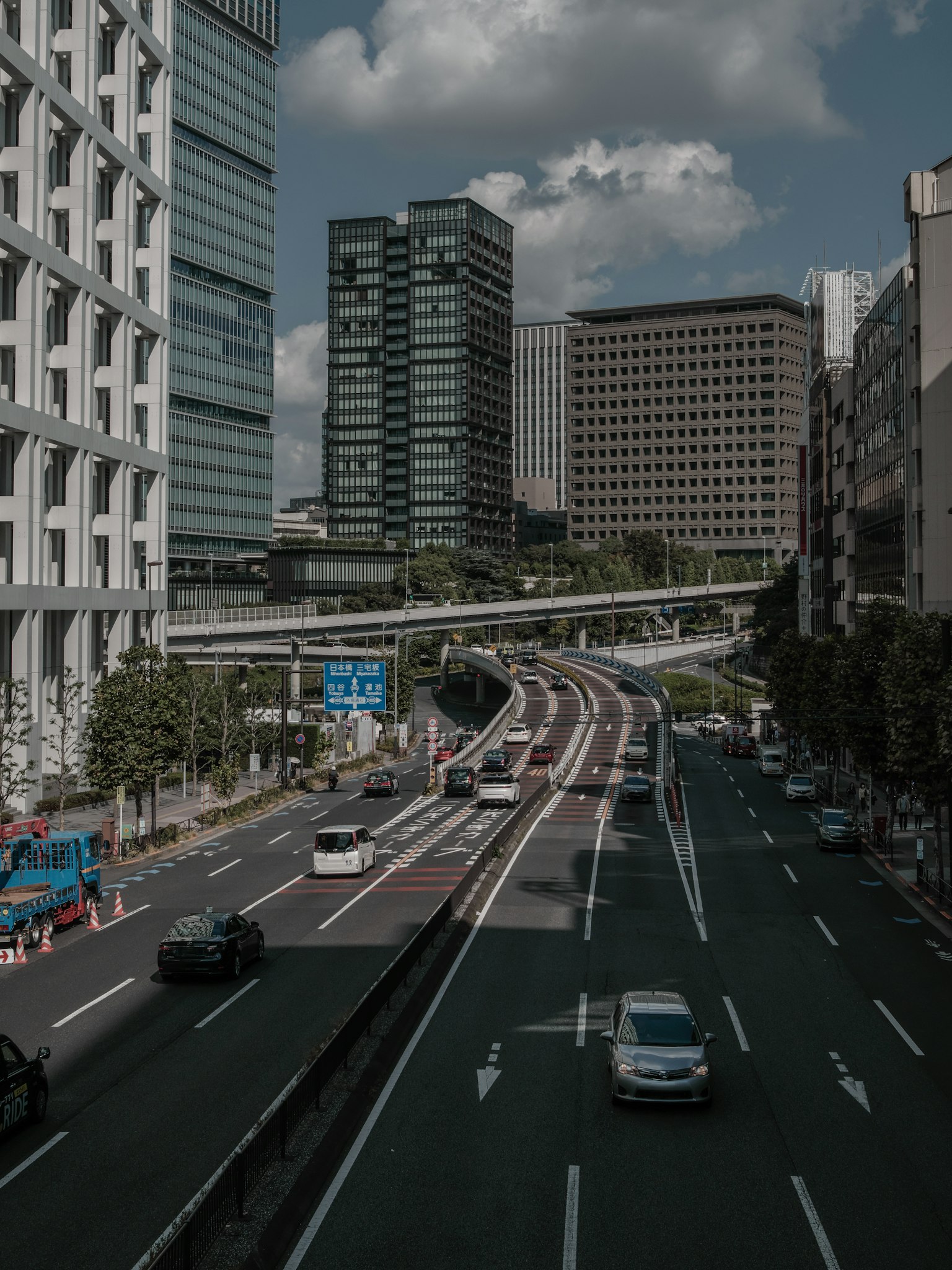 Urban landscape featuring skyscrapers and flowing traffic