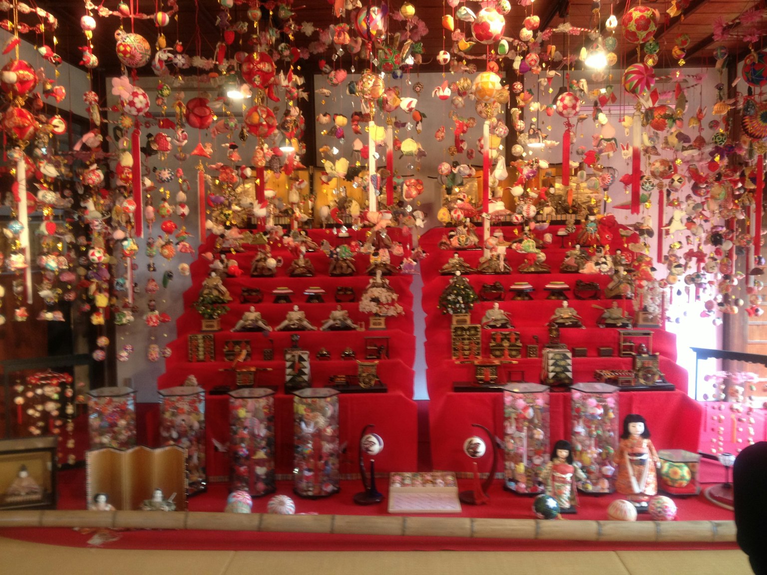Traditional hina matsuri display with colorful decorations and figurines