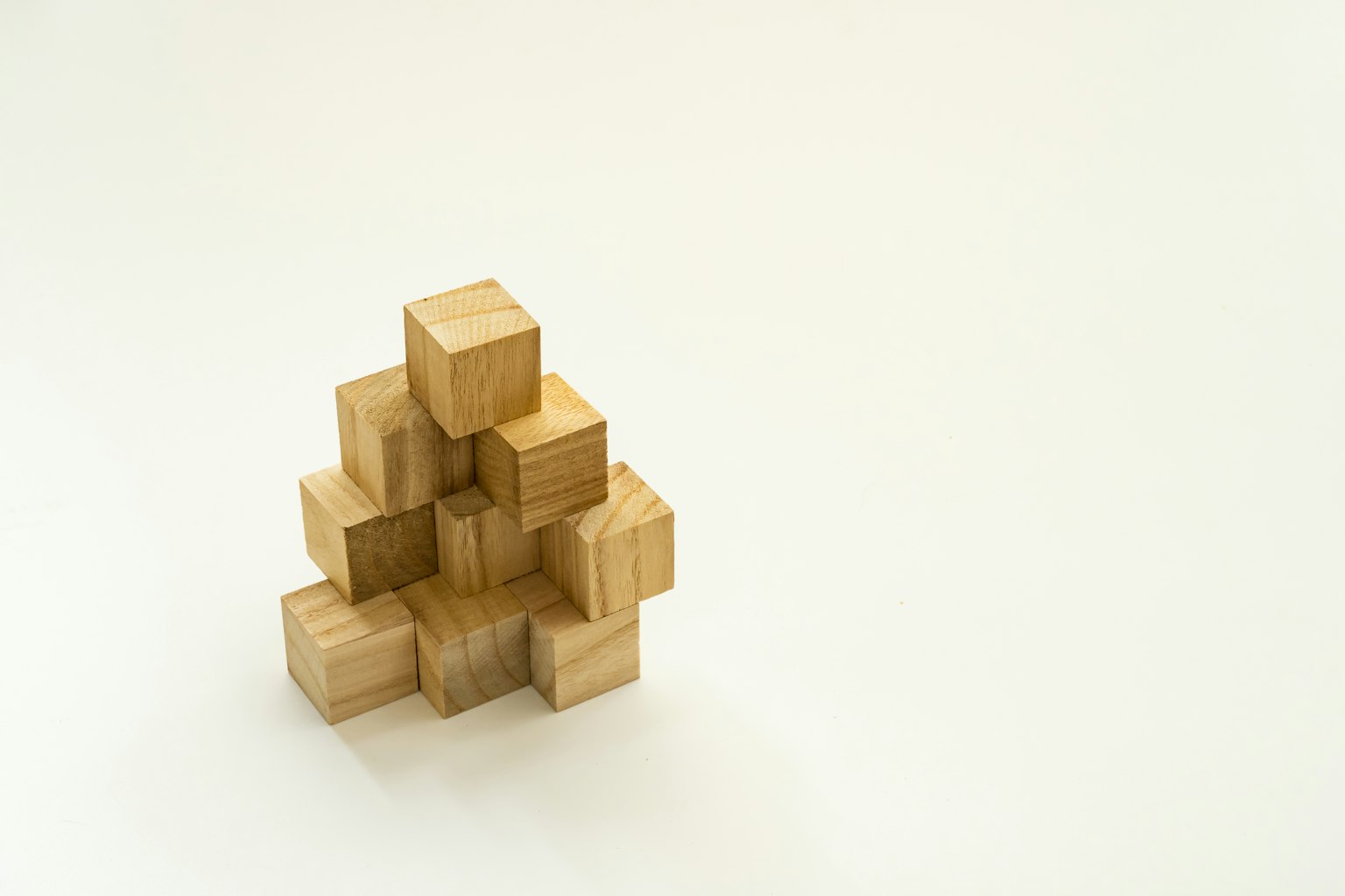 Pyramid structure made of wooden blocks