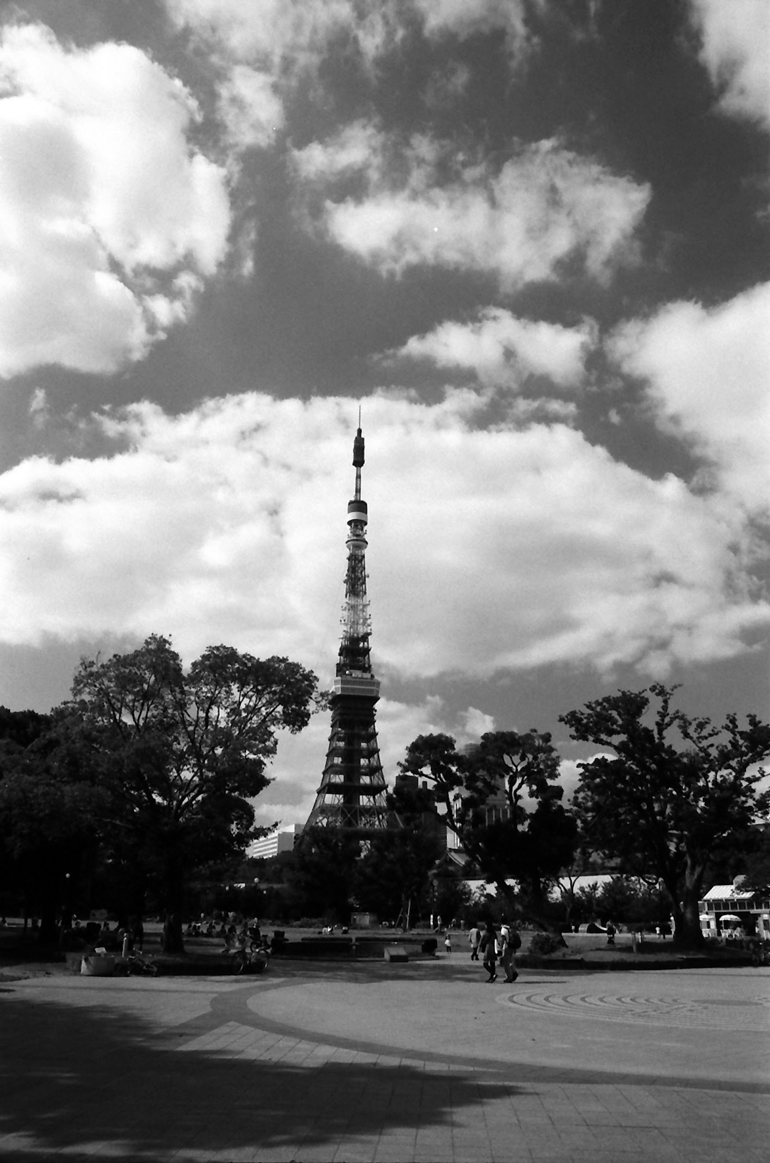 Monochrome photo of Tokyo Tower with a sky full of clouds