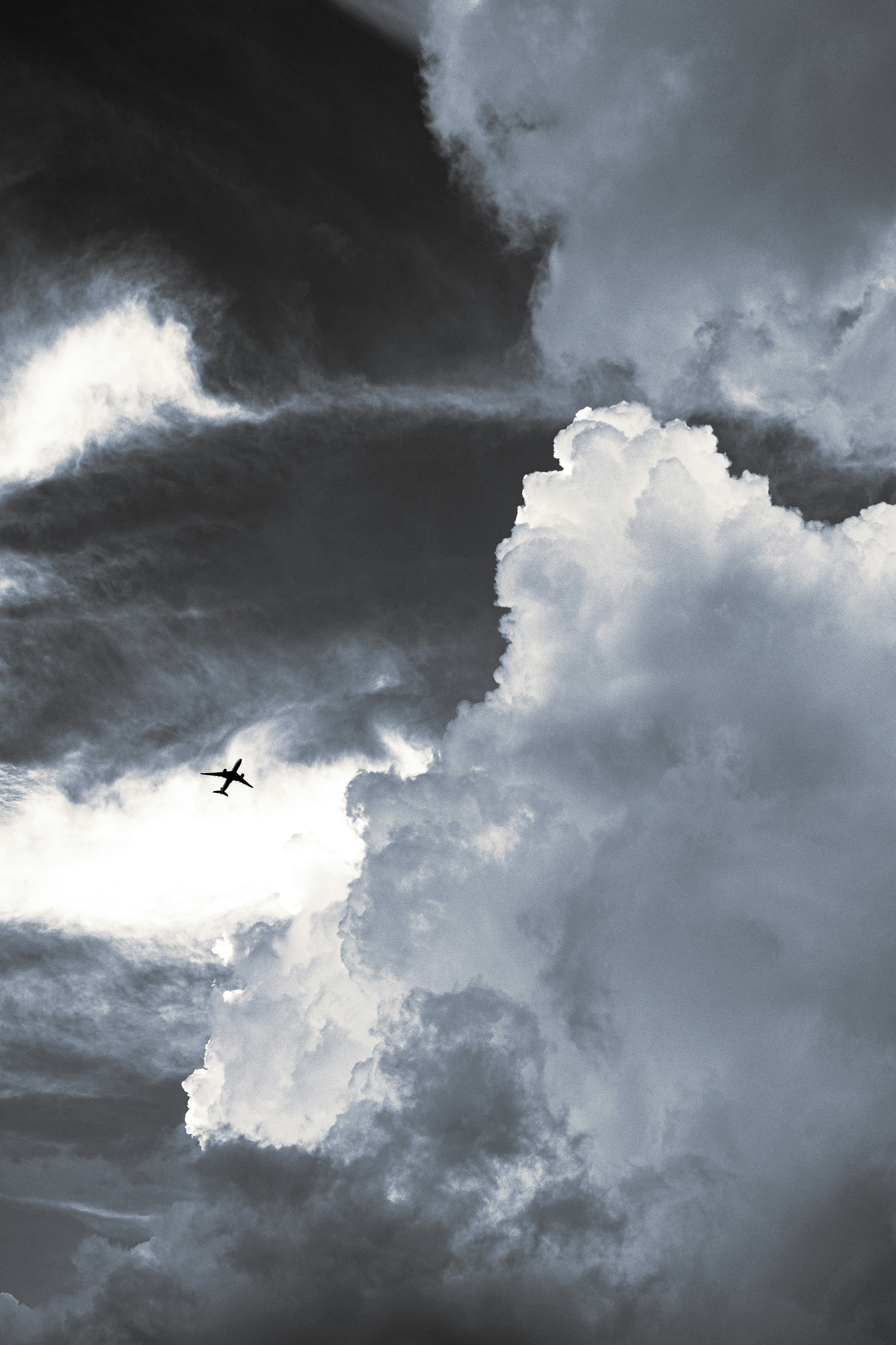 sky with dramatic clouds and contrails