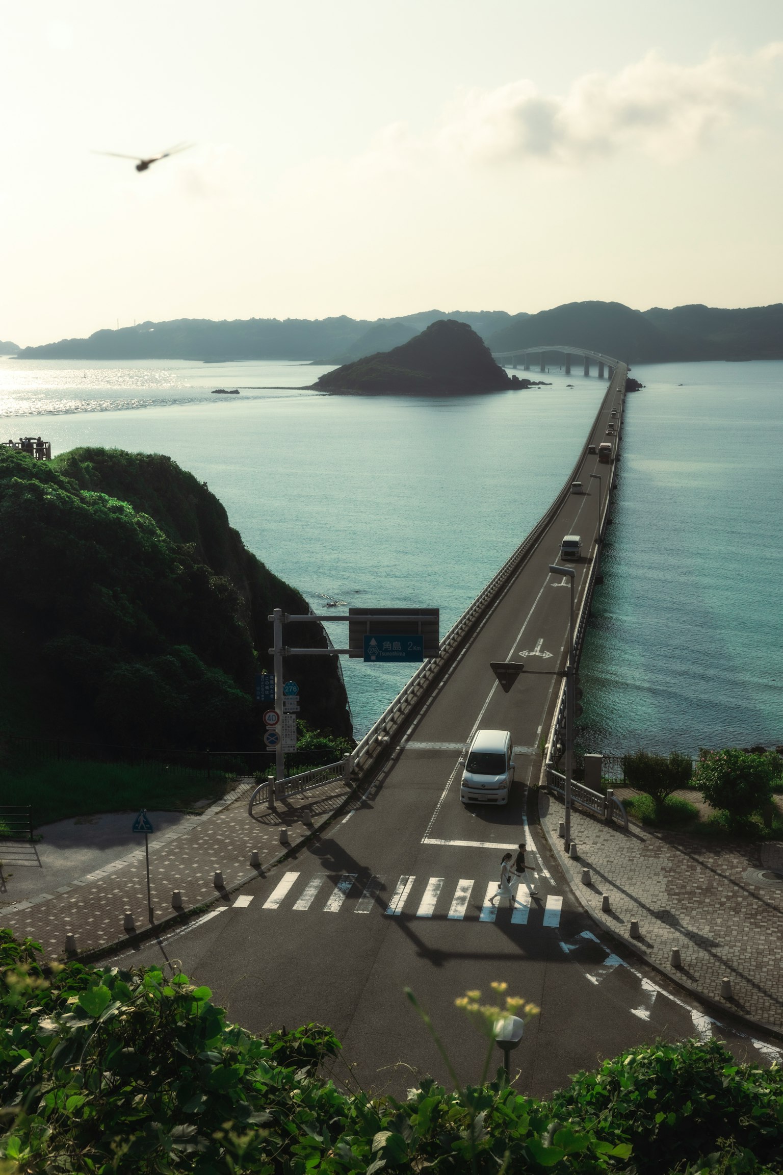 Scenic view of a long bridge connecting an island to the mainland