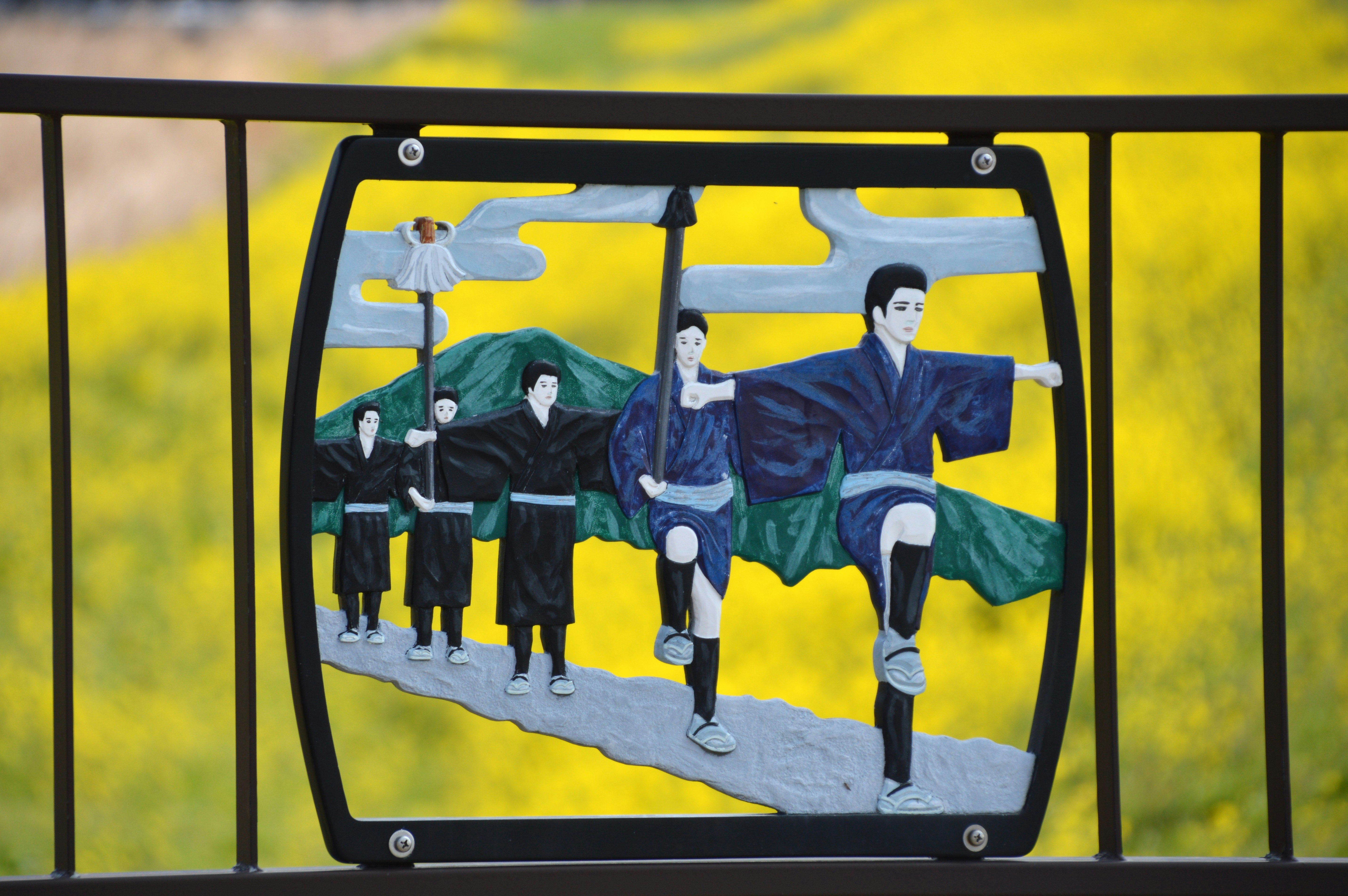 Person-themed railing artwork on Sata River Bridge in Asakura, Fukuoka