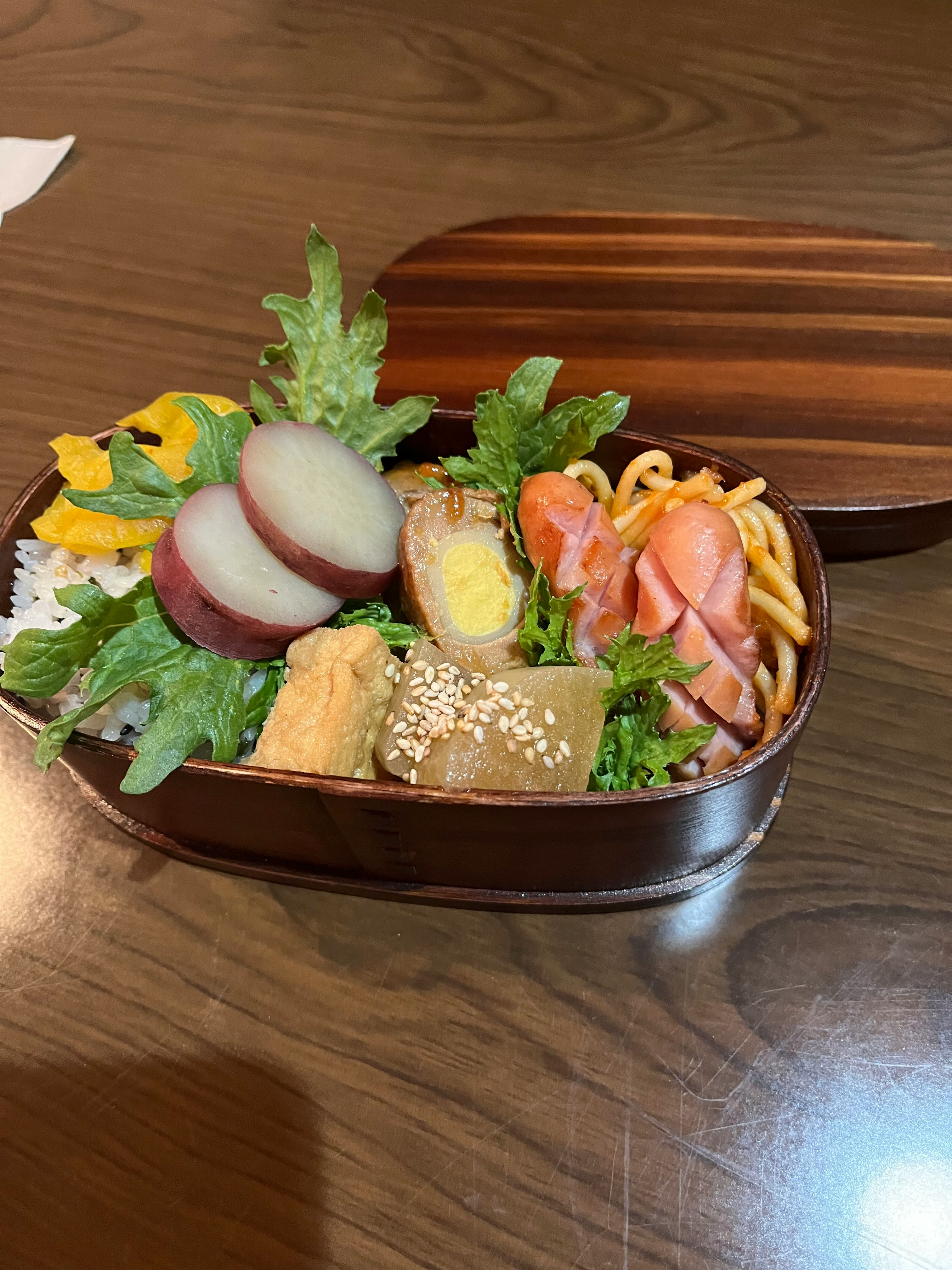bento lunch in a wooden tray