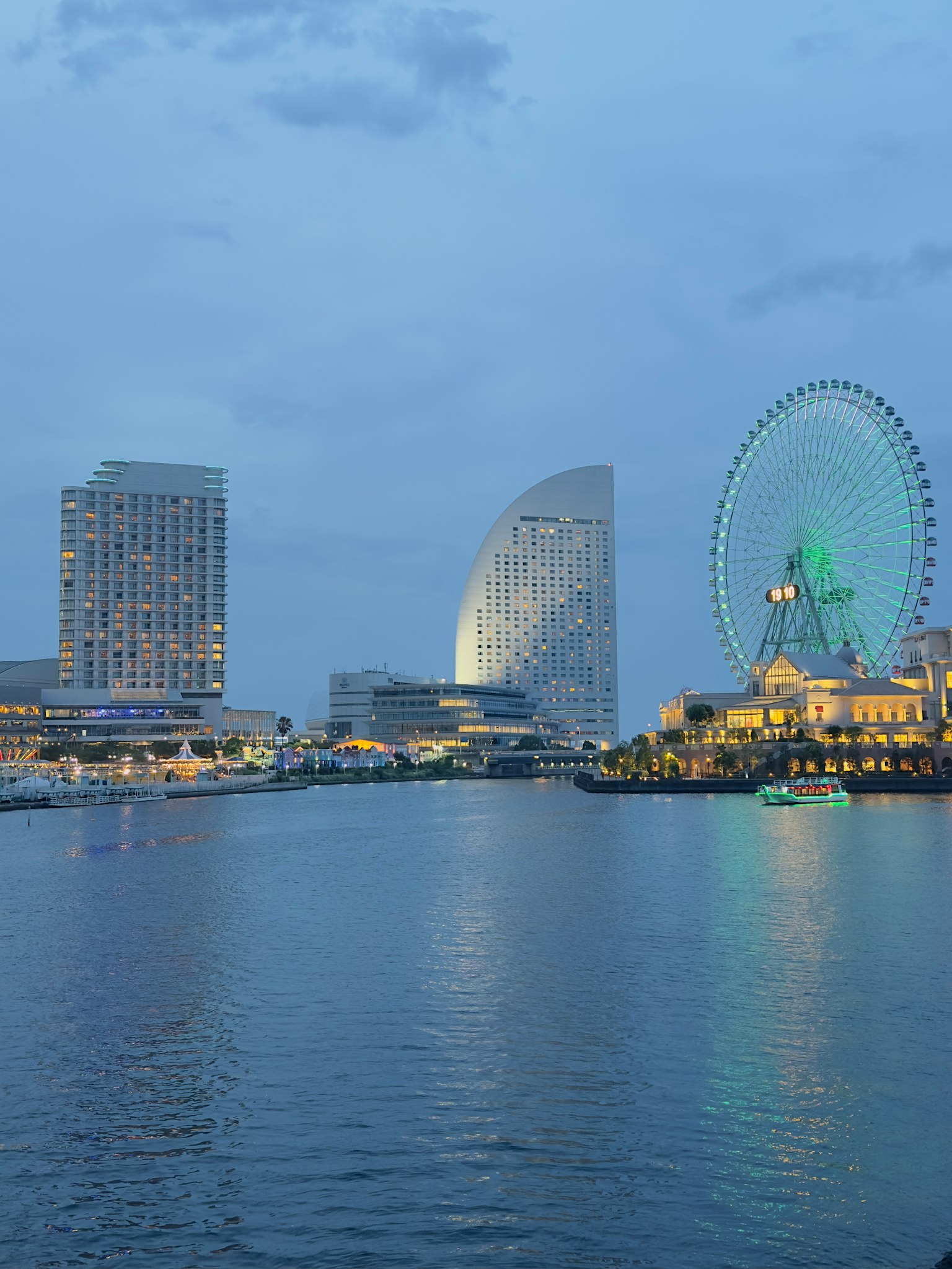 Yokohama cityscape at dusk featuring a Ferris wheel and skyscrapers