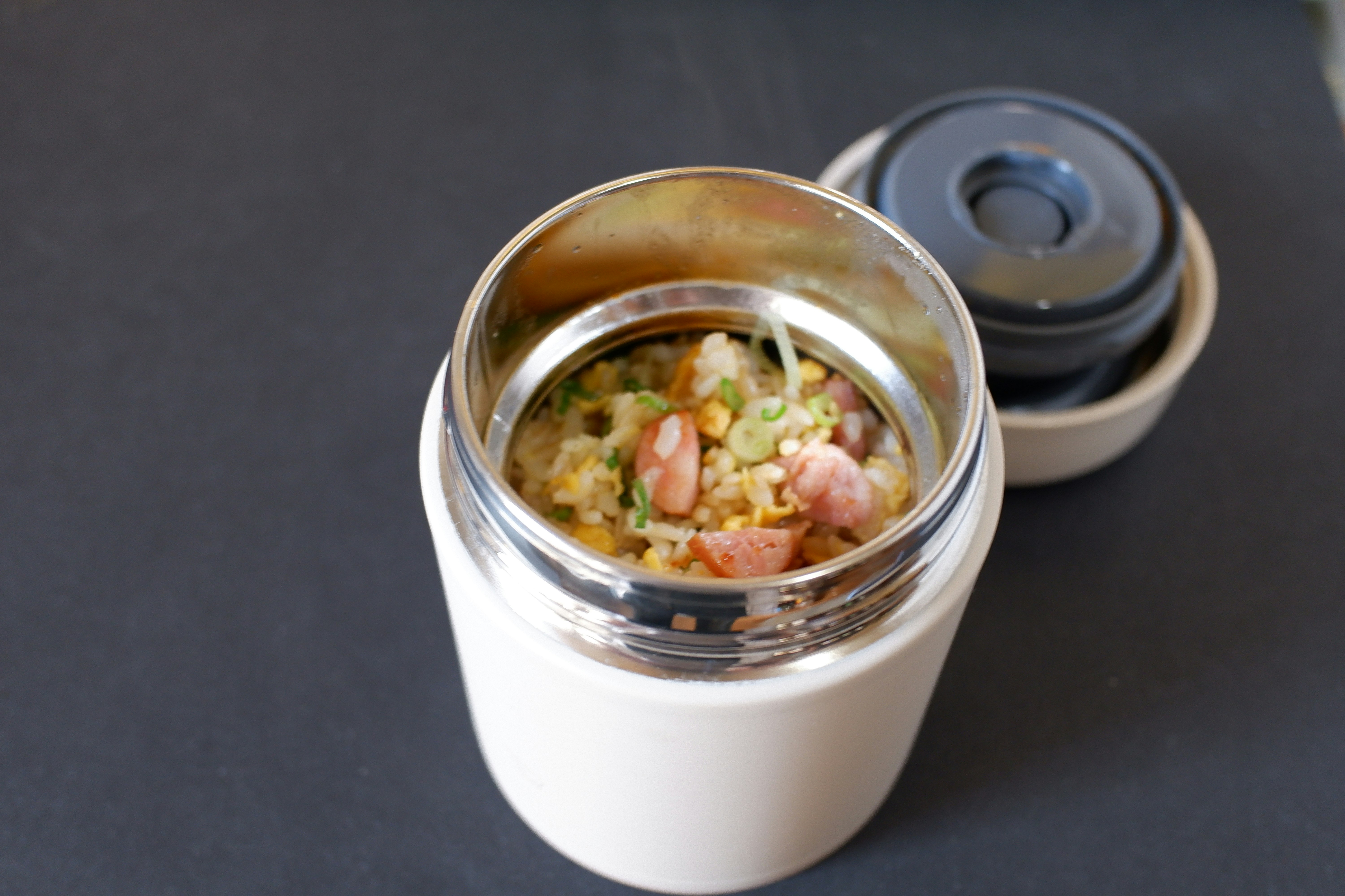 salad bowl with mixed ingredients in a container