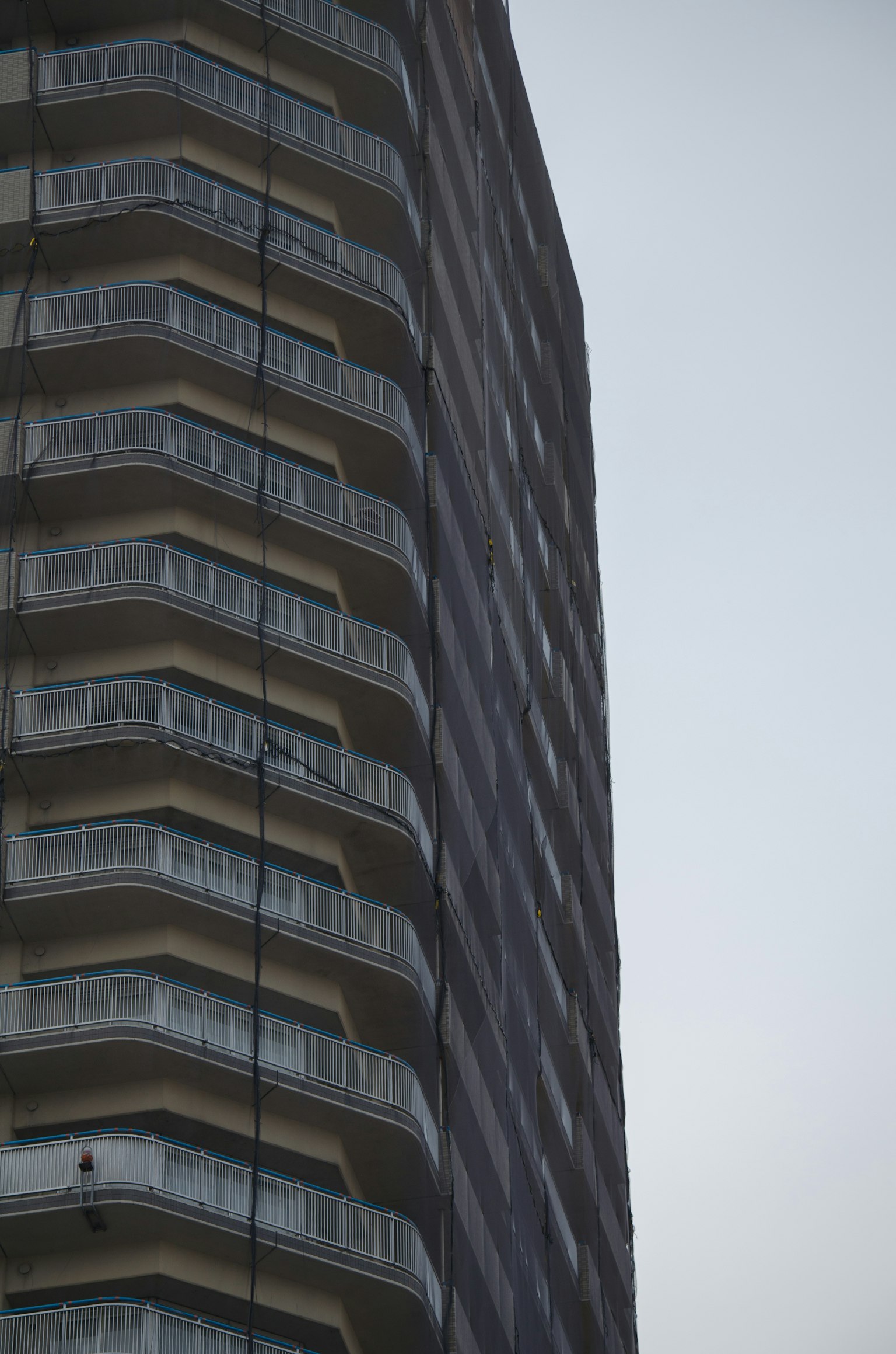 Detail of a high-rise building with balconies and exterior