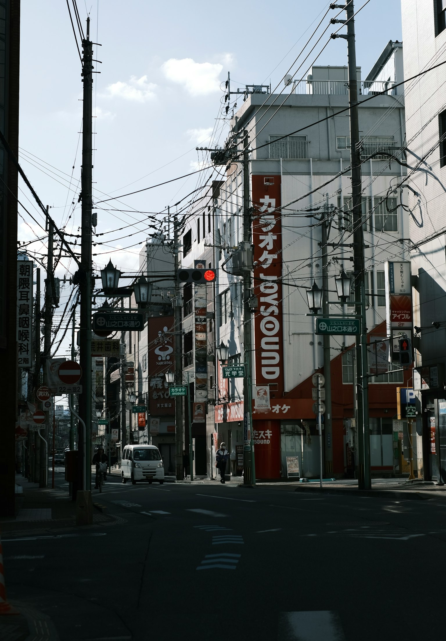 City street scene with buildings and utility poles
