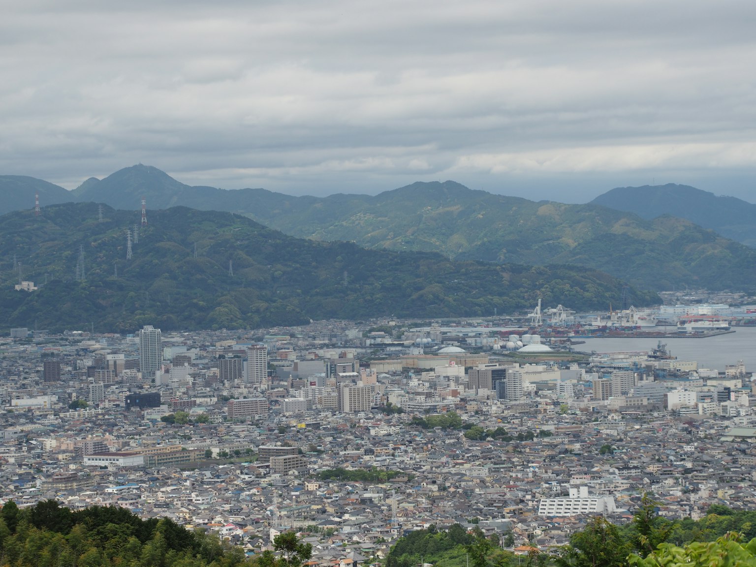 Cityscape view from a mountain overlooking the sea