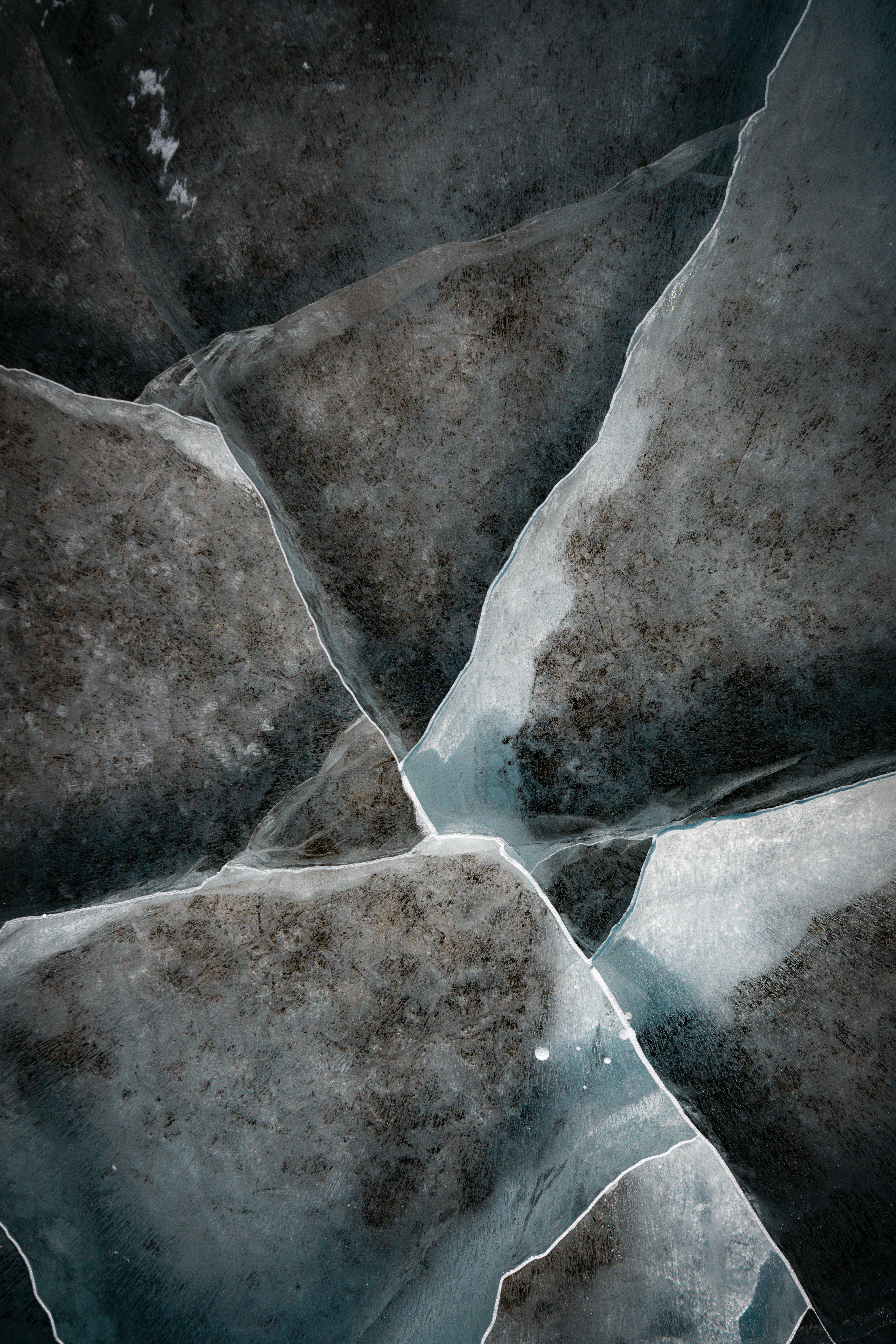 close-up of ice blocks with crystal-like cracks and translucency
