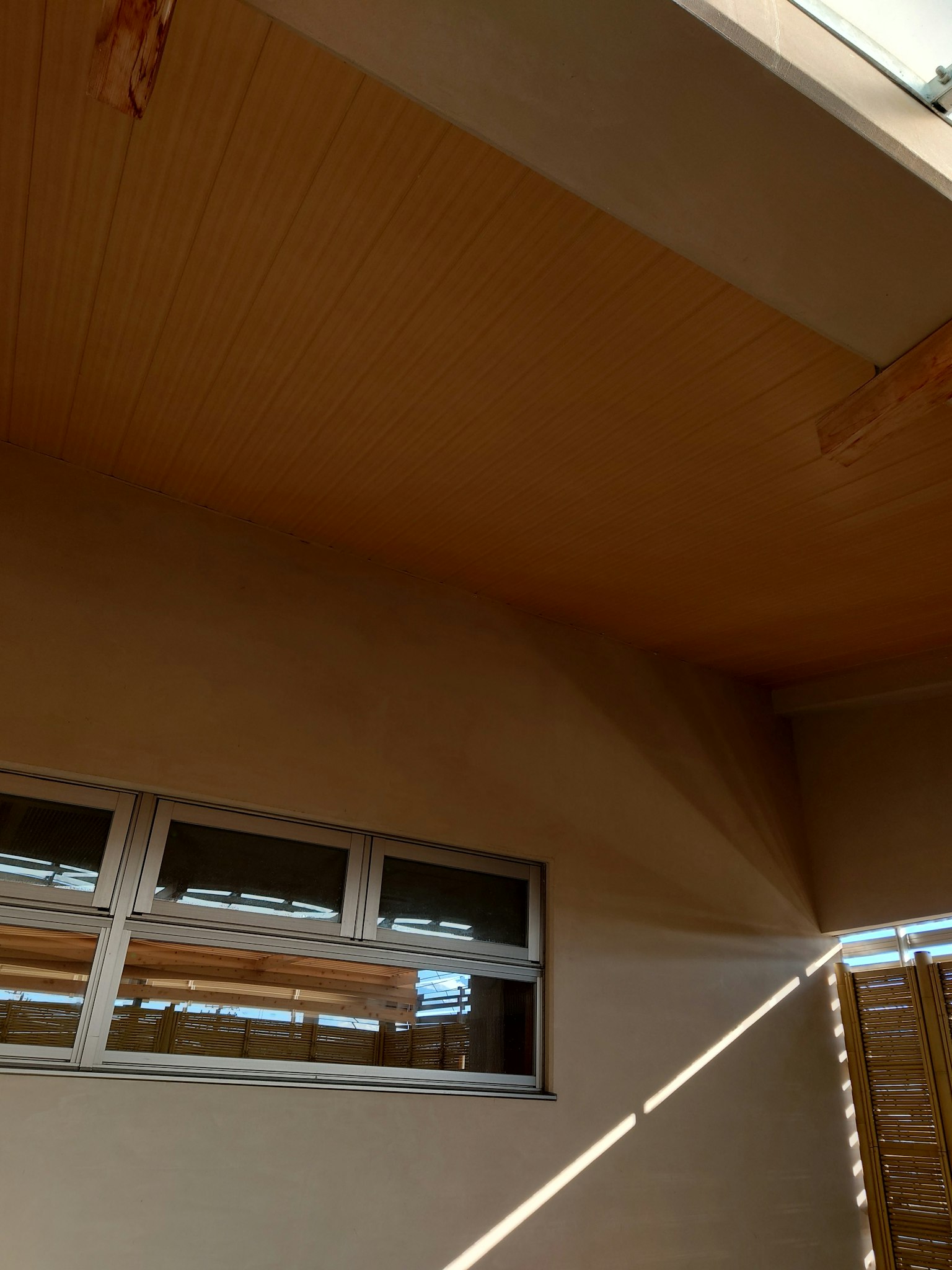 Interior view showcasing ceiling and window structure