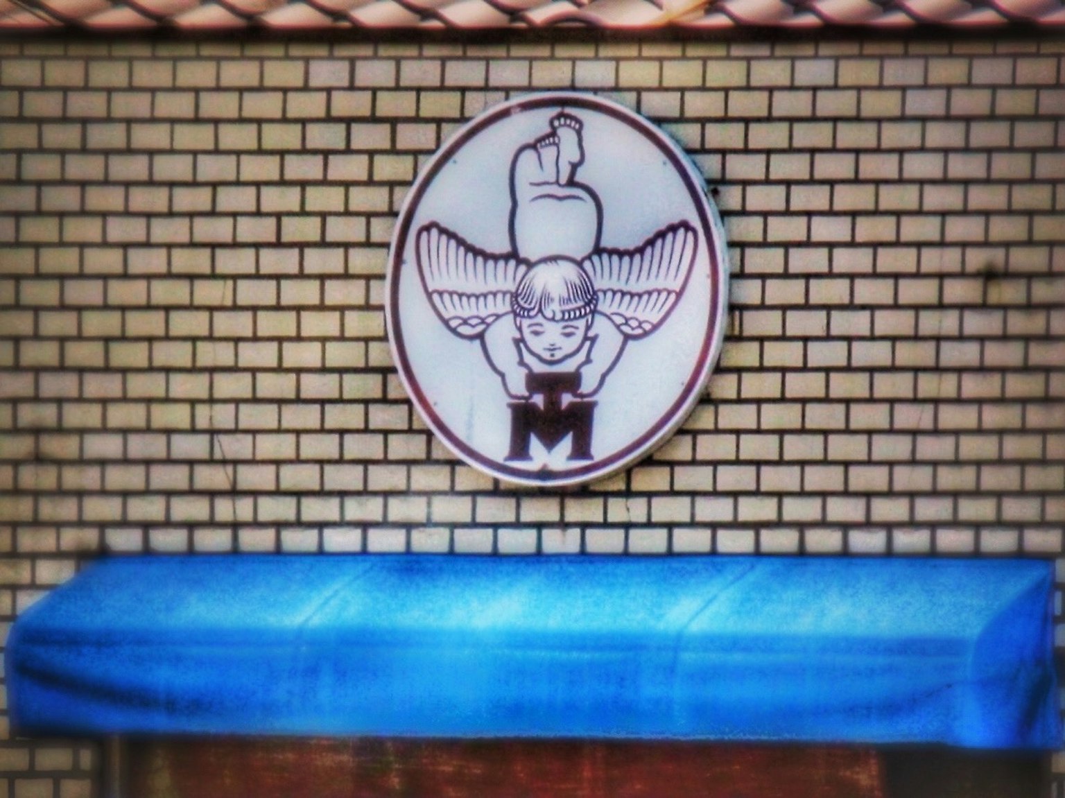 Illustration of a character with raised hand on a store sign