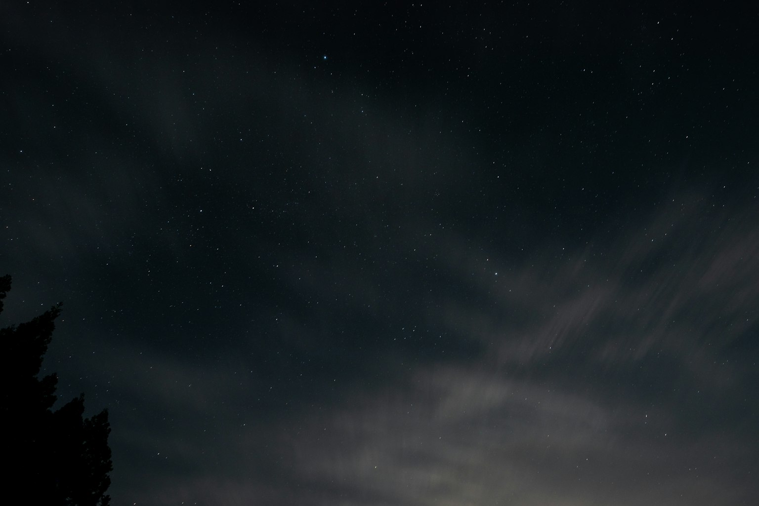 Night sky with stars and clouds