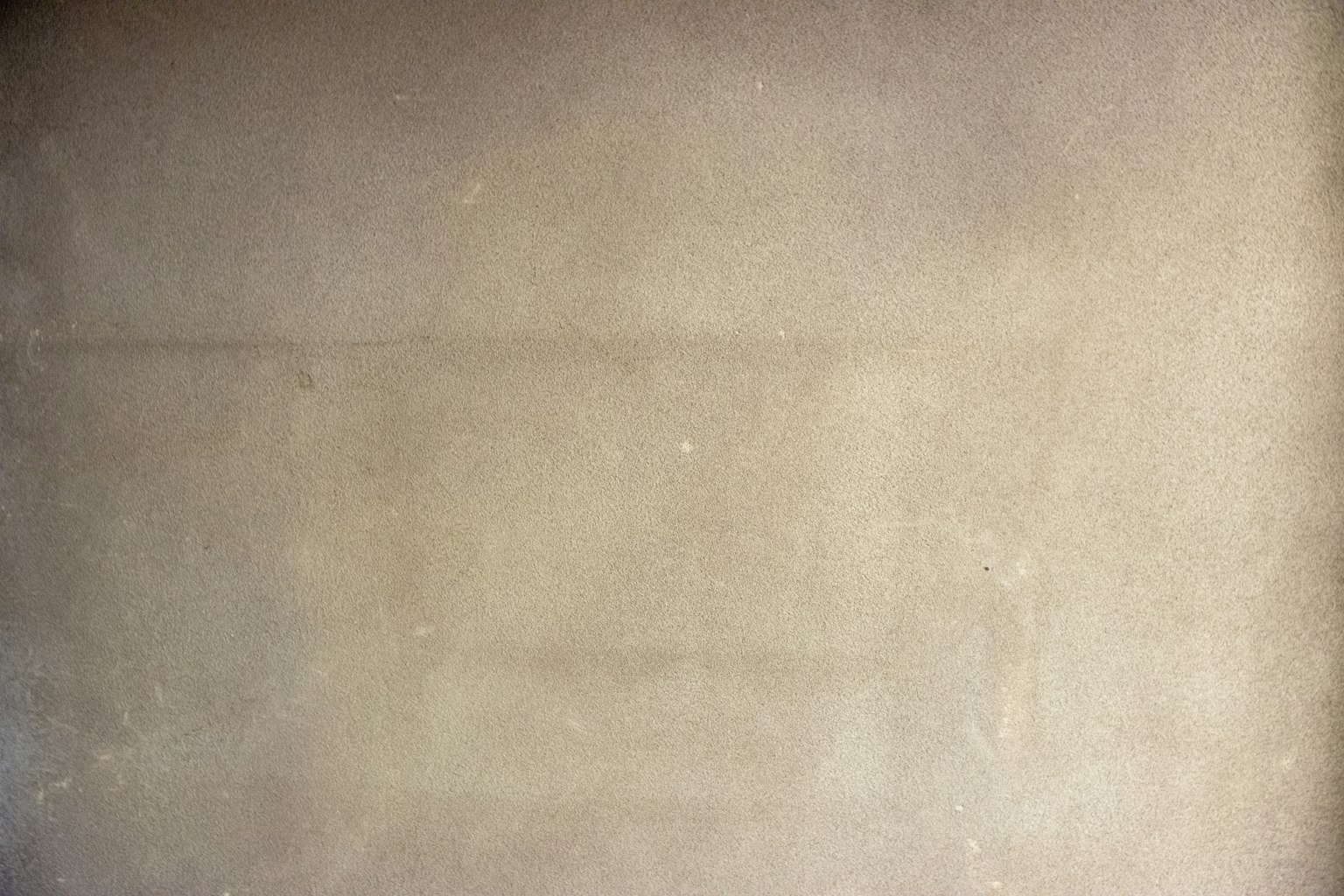 Fond texturé beige clair uni