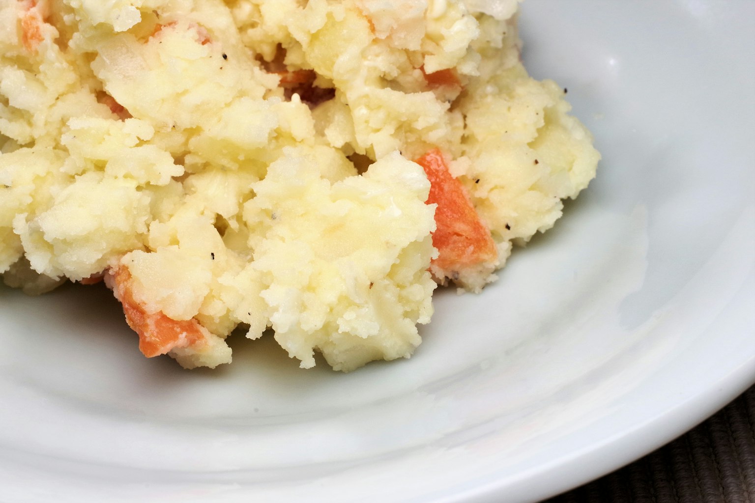 Creamy mashed potatoes mixed with small shrimp