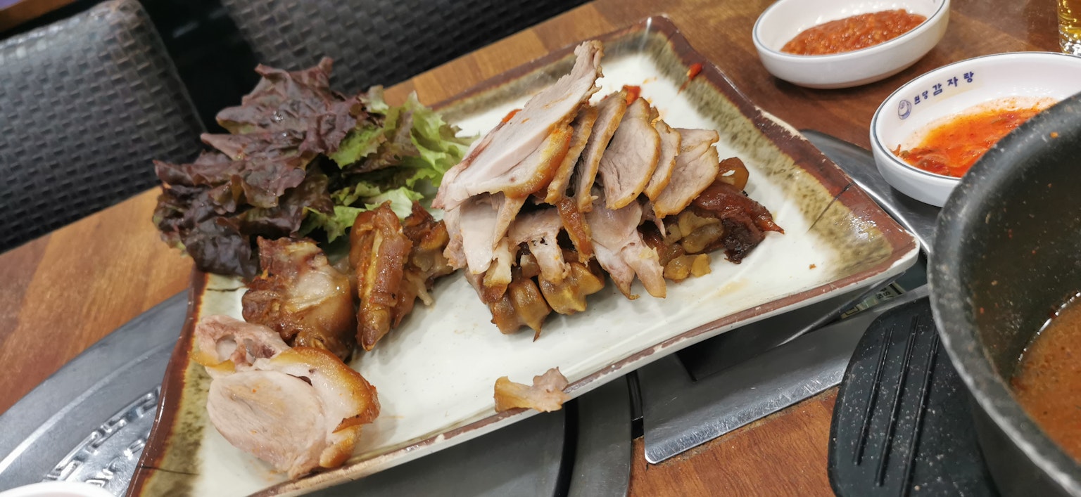 A beautifully arranged platter of meat and vegetables