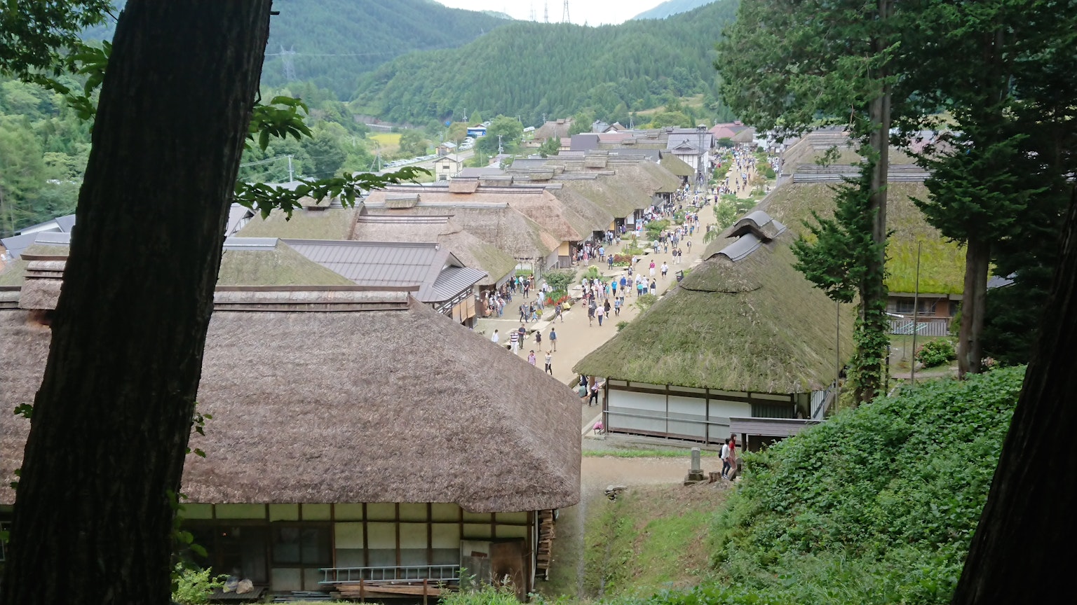 Traditional Japanese village landscape in the mountains with thatched roof houses
