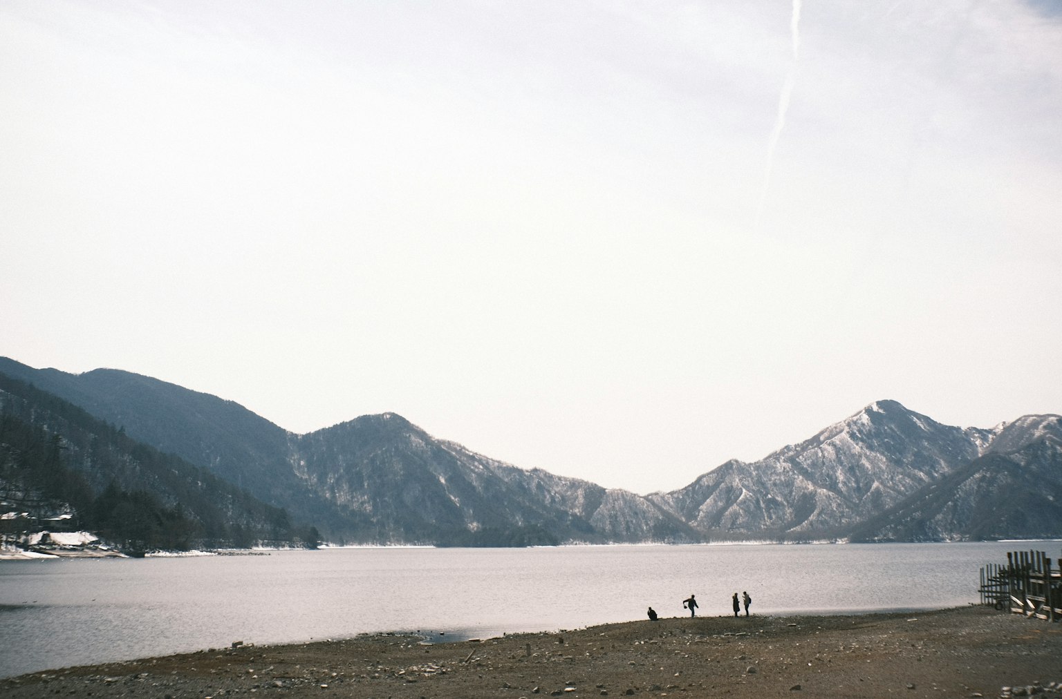 Scenic view of snow-capped mountains and a tranquil lake