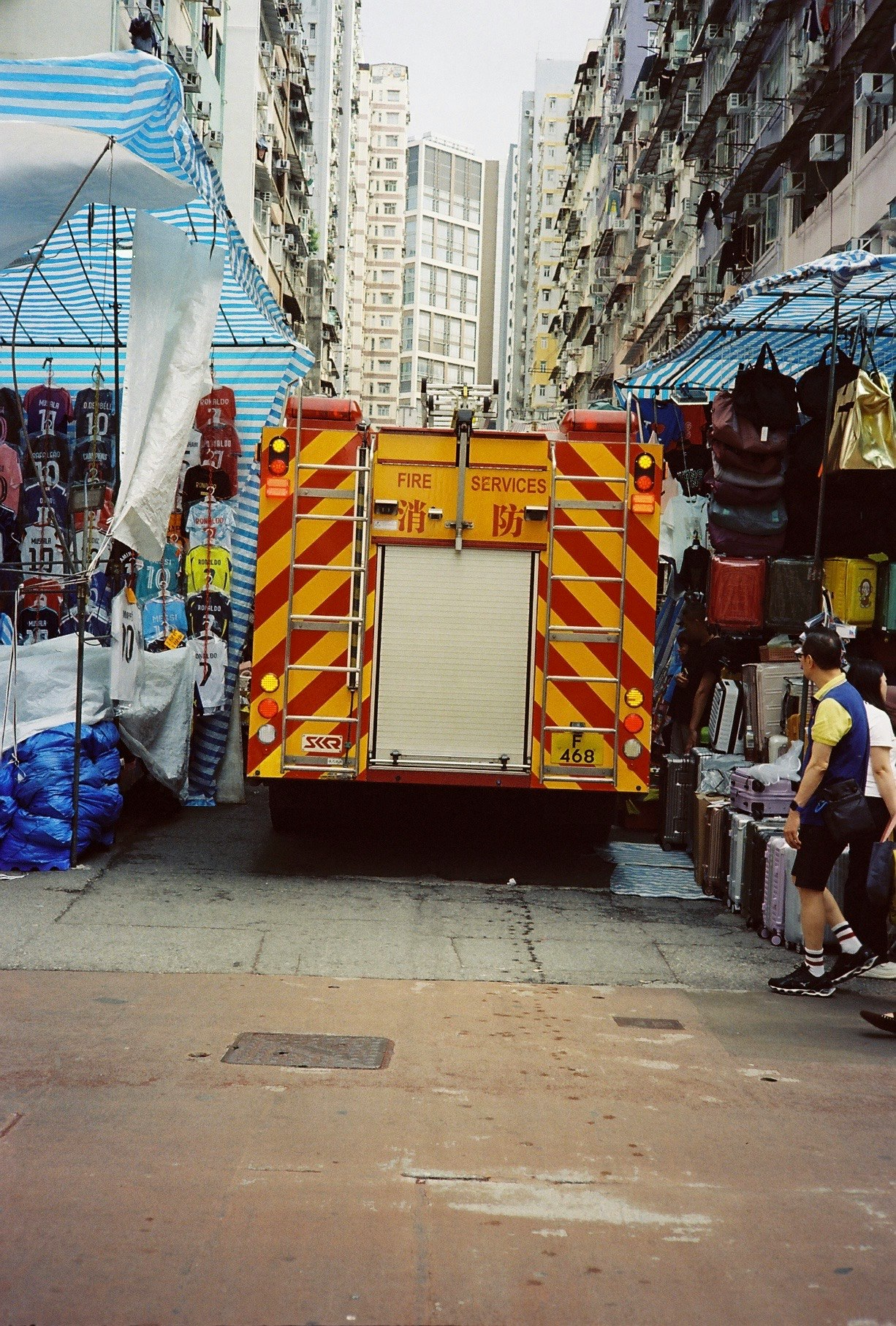 fire truck and rescue equipment at a narrow street corner