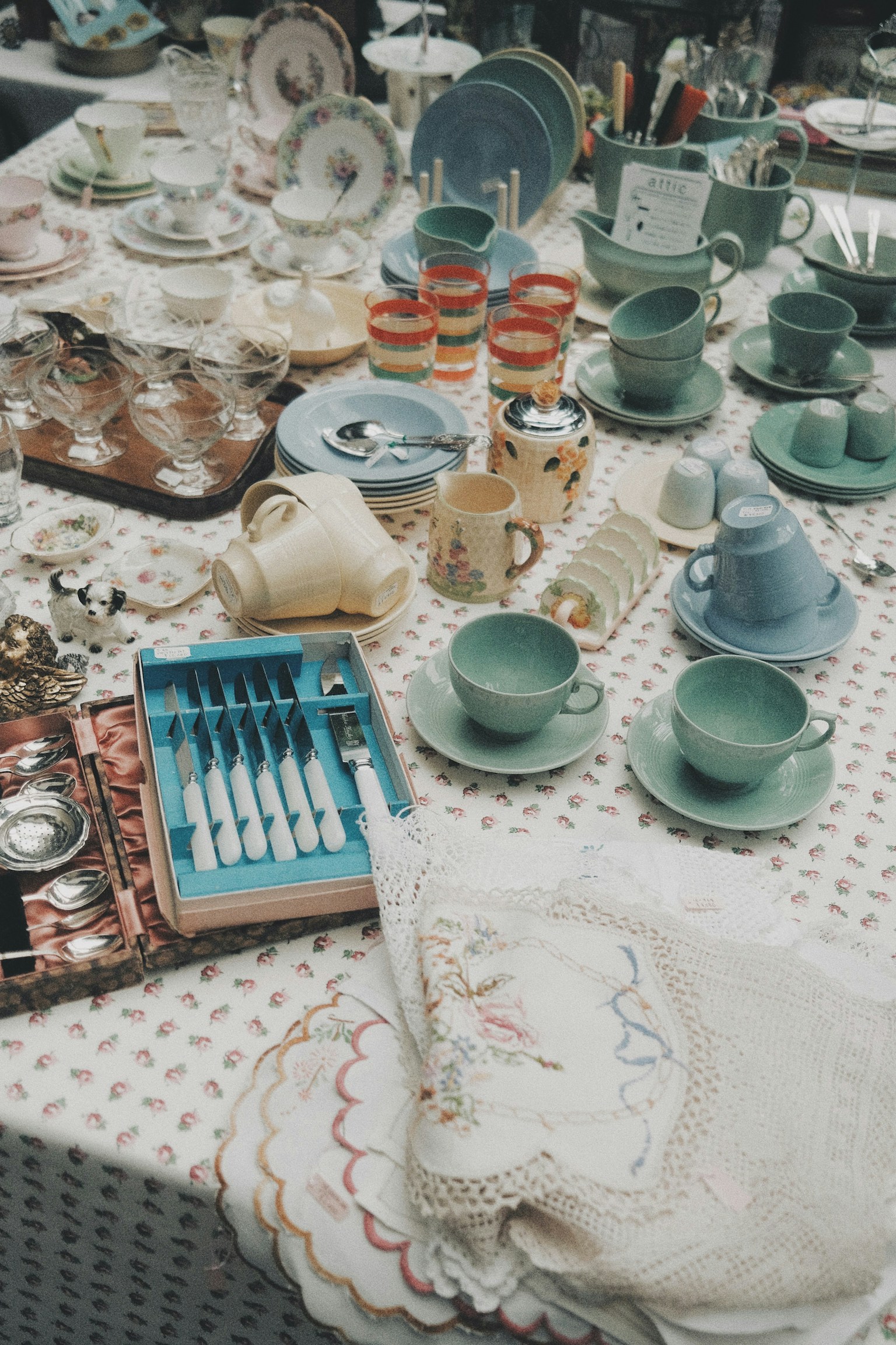 A display of colorful dishes and utensils arranged on a table