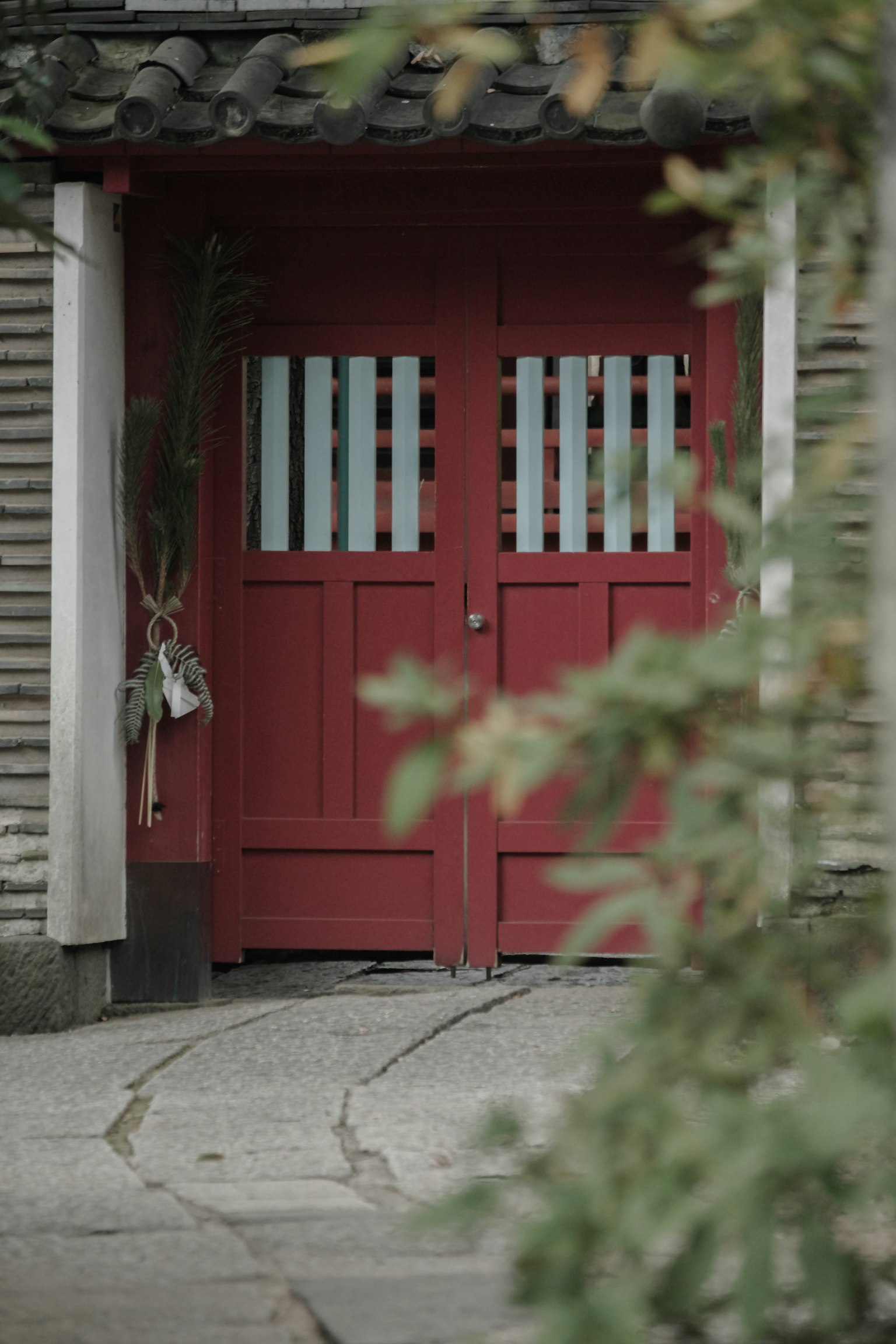 Entrance of an old building with distinctive red door
