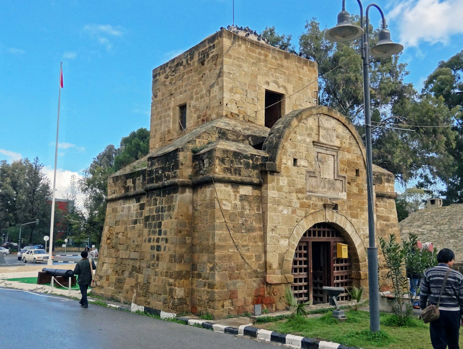 Historic stone building with clear blue sky