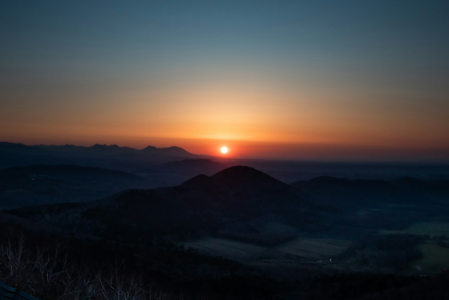 Stunning sunrise over mountains with a gradient sky