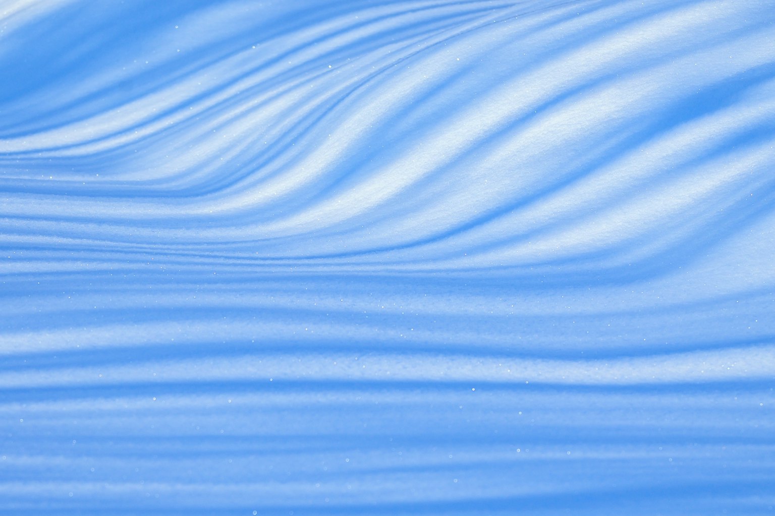 Background featuring wavy patterns in shades of blue