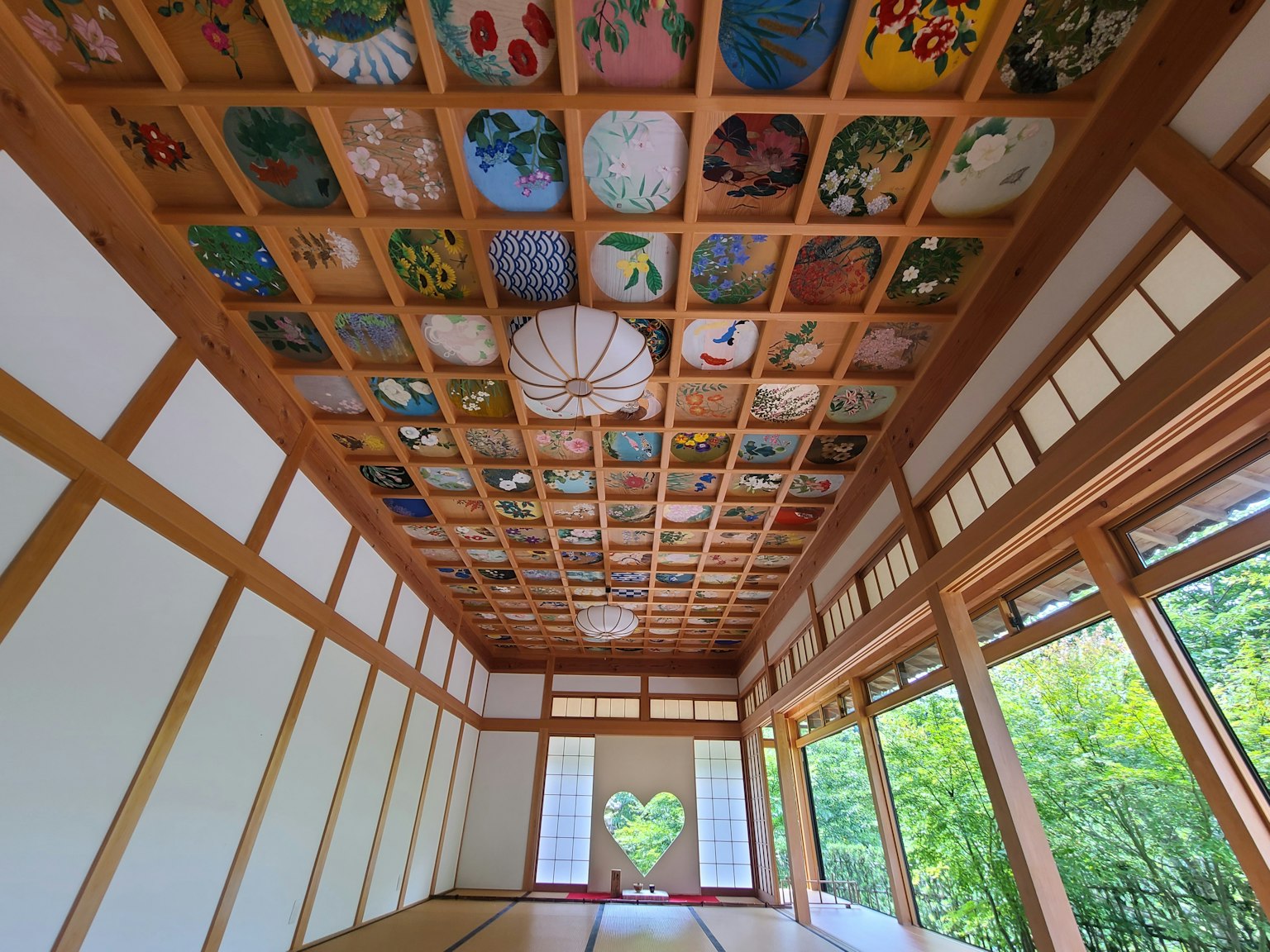 Interior view of a traditional room with a beautifully painted ceiling