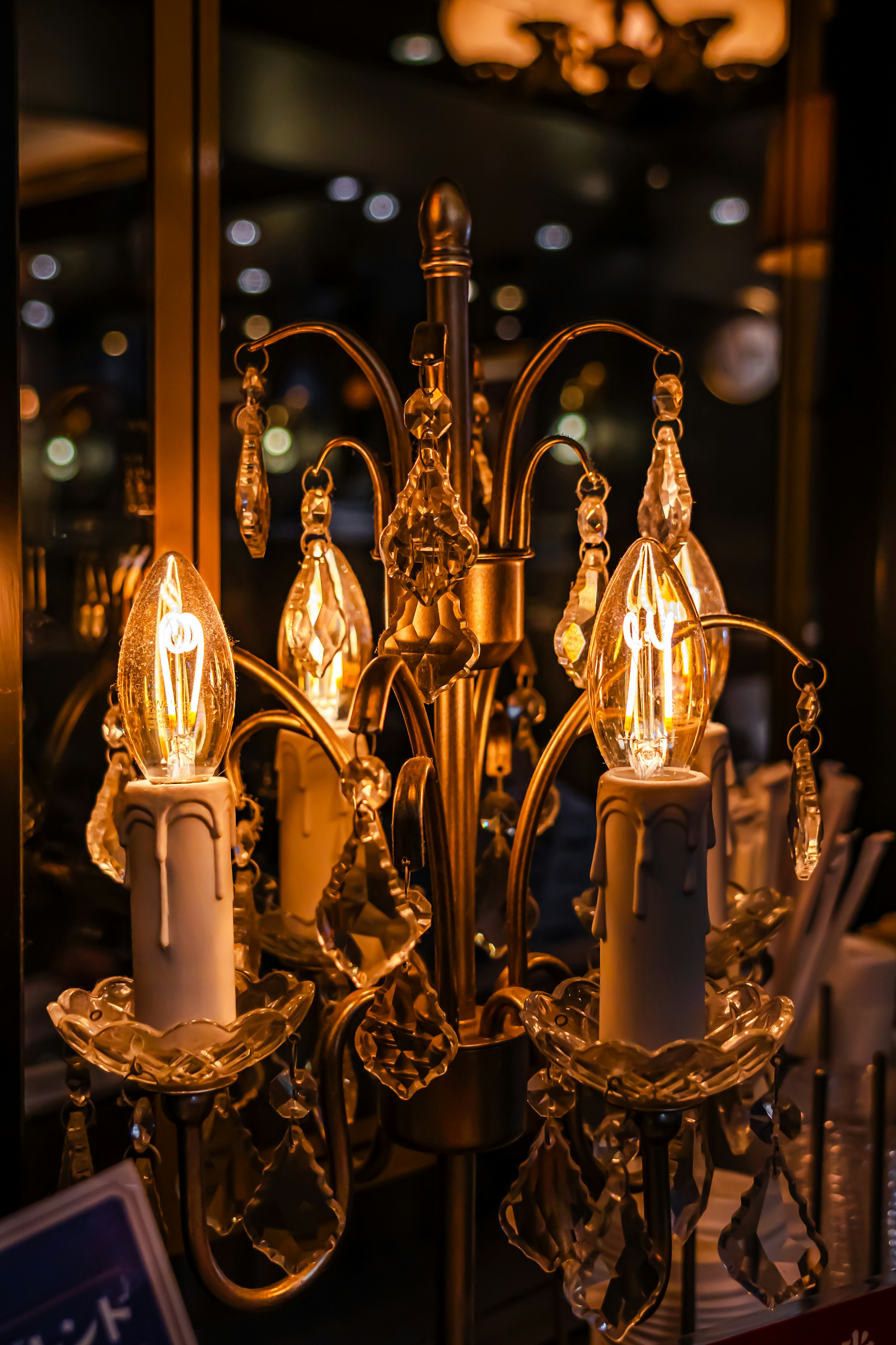 Chandeliers glowing inside a shop in Osaka