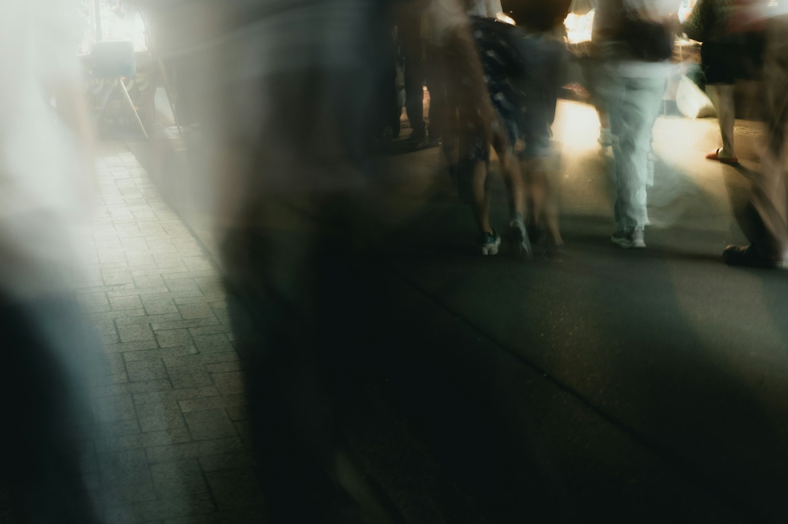 Blurred crowd walking on a city street
