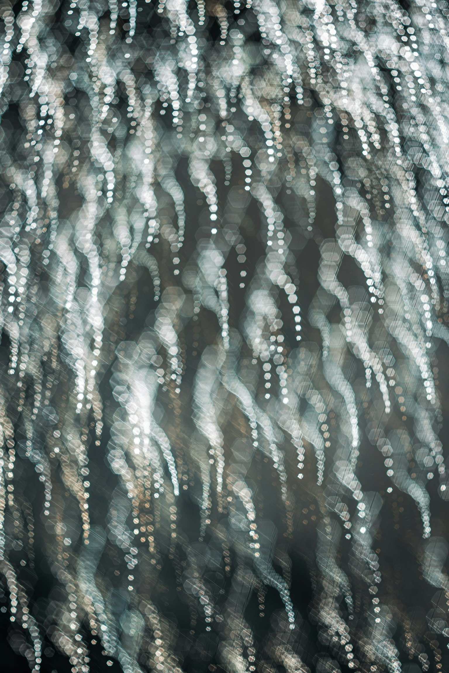 Image featuring beautiful light patterns resembling flowing water