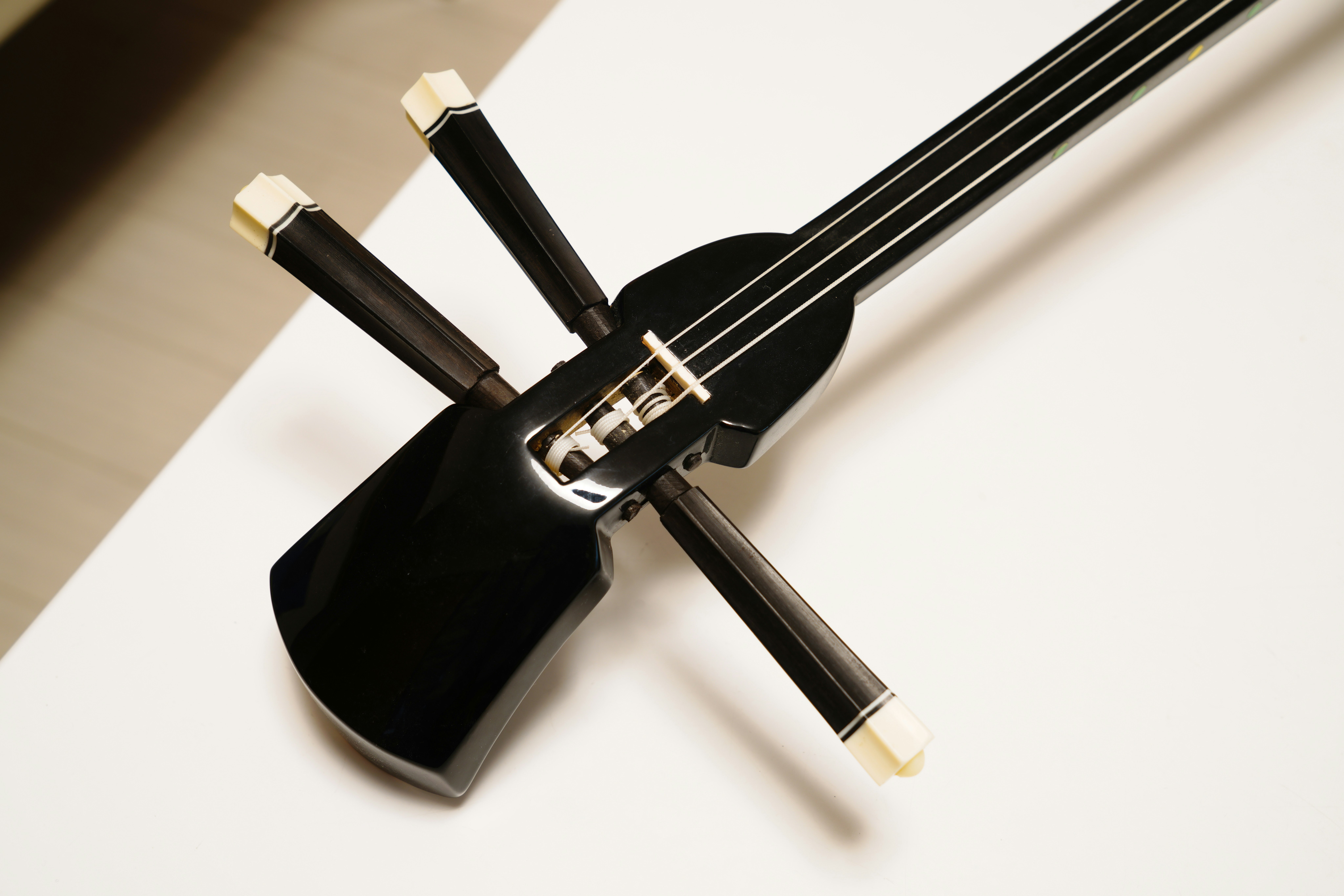 close-up of black metal clamps and cables on a mechanical component