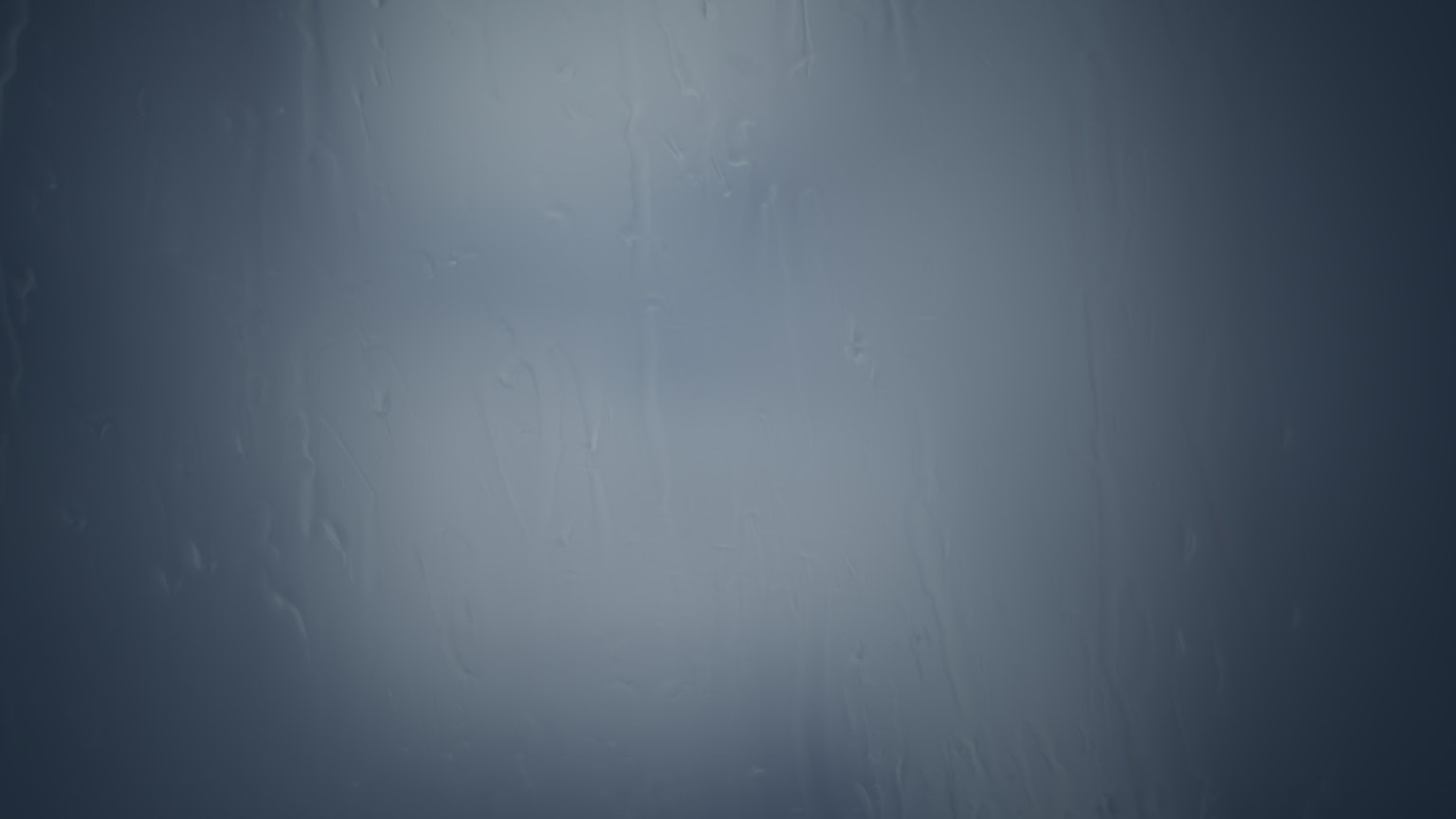 Blurred abstract background in shades of blue and gray