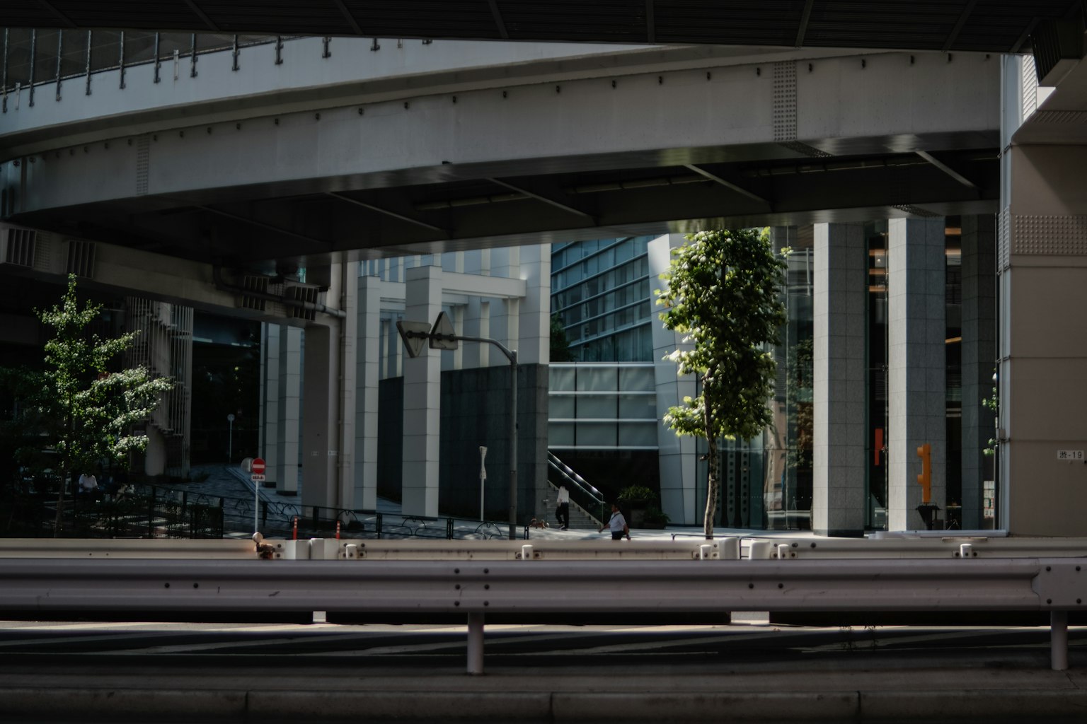 Urban landscape featuring high-rise buildings and bridge structures