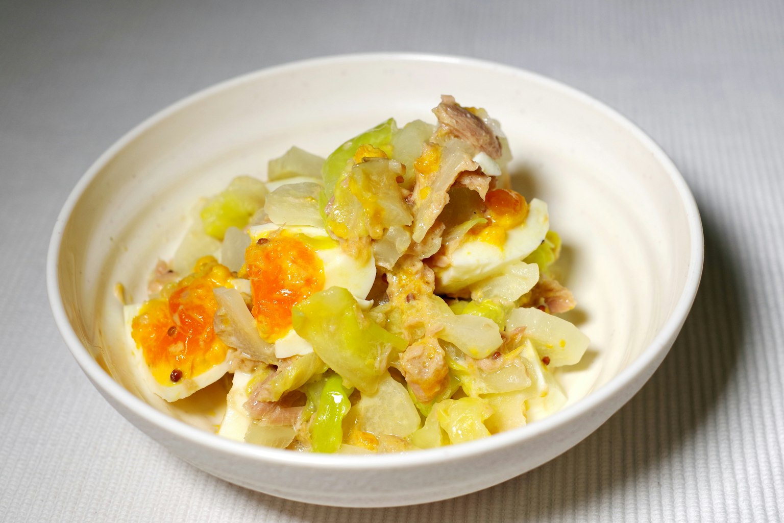 Dish featuring eggs and mixed vegetables