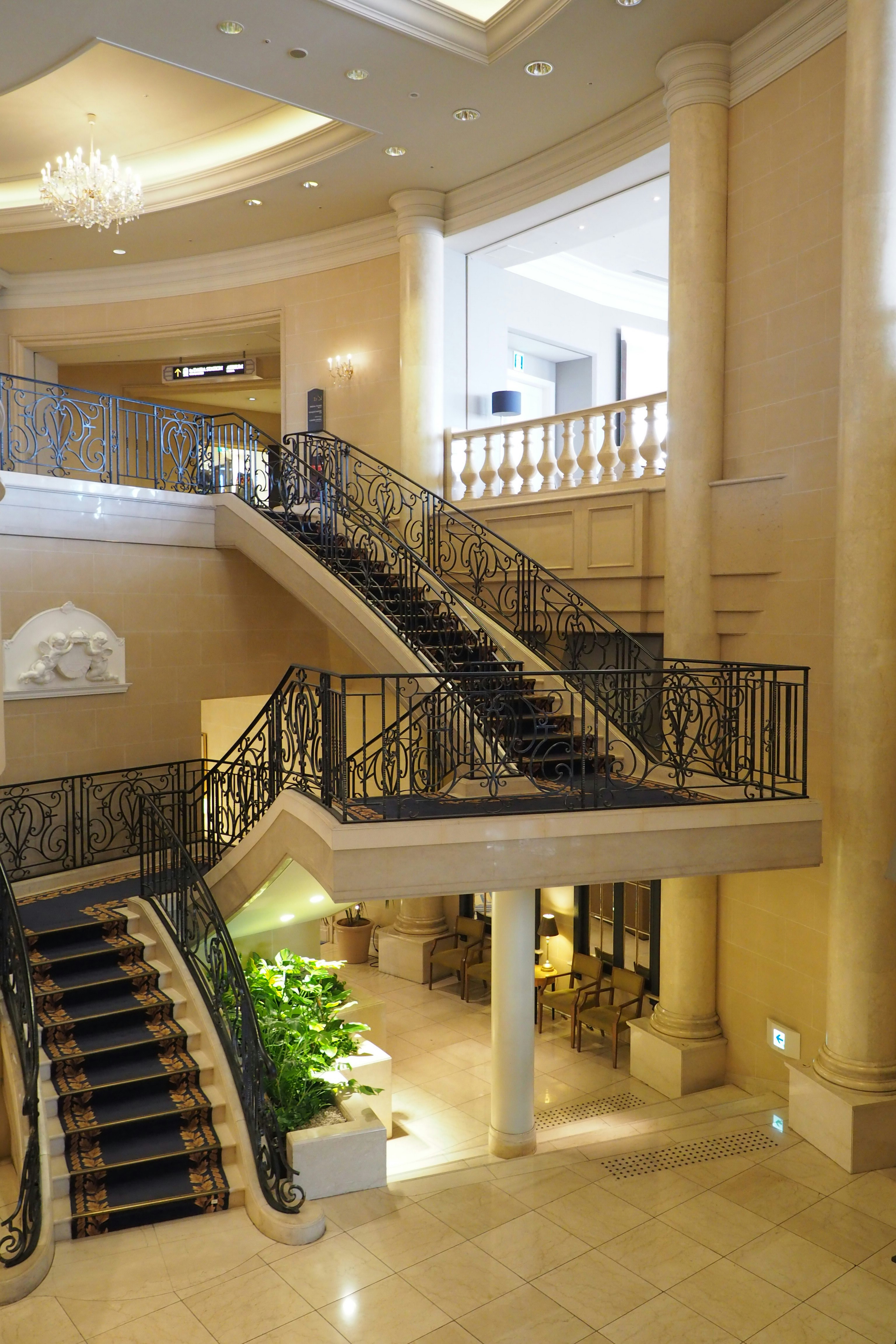 luxurious stair hall with a double-height atrium