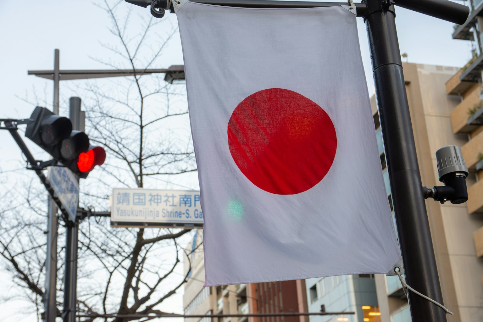 Japanese flag displayed in an urban setting