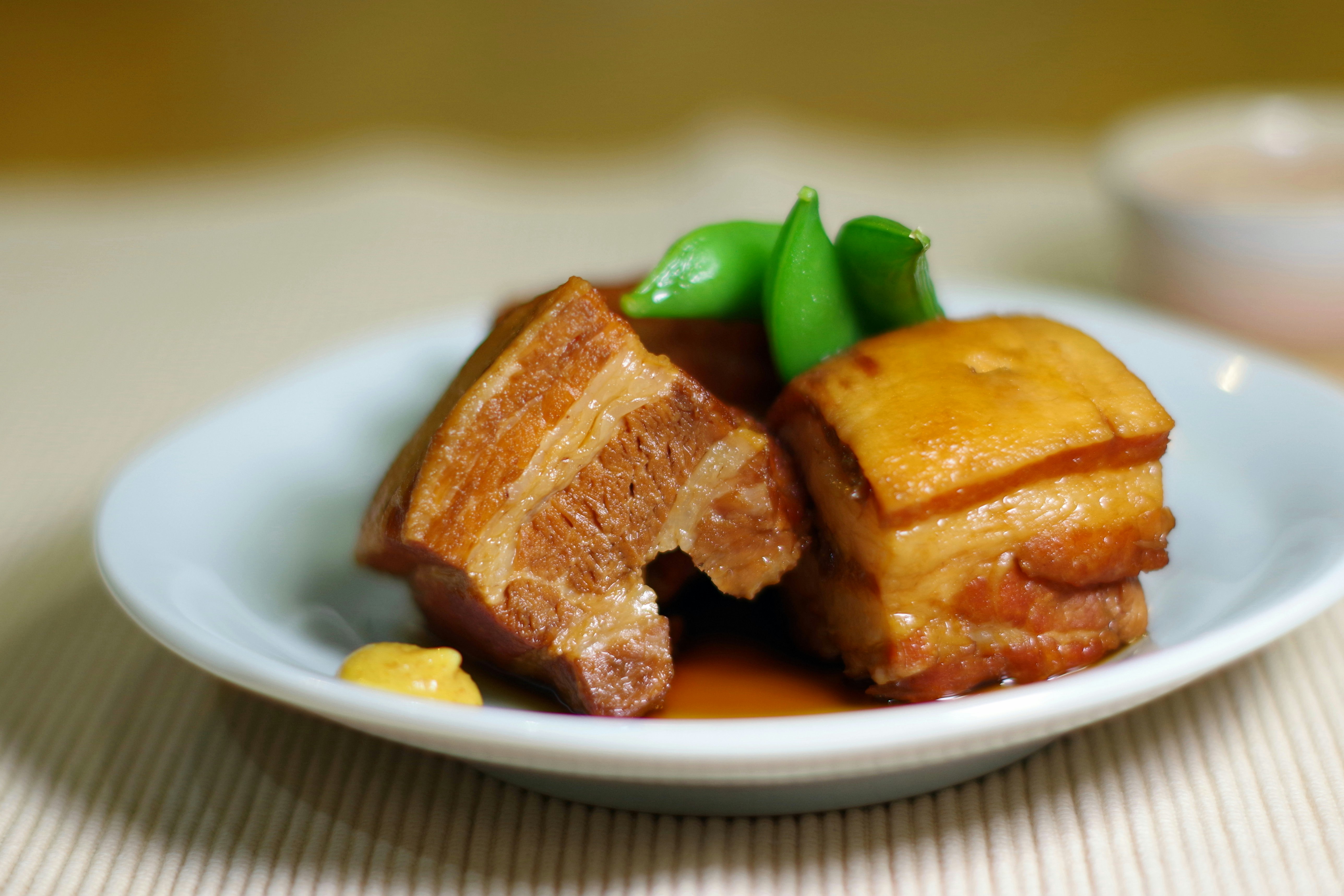 plate of meat dish with side garnish