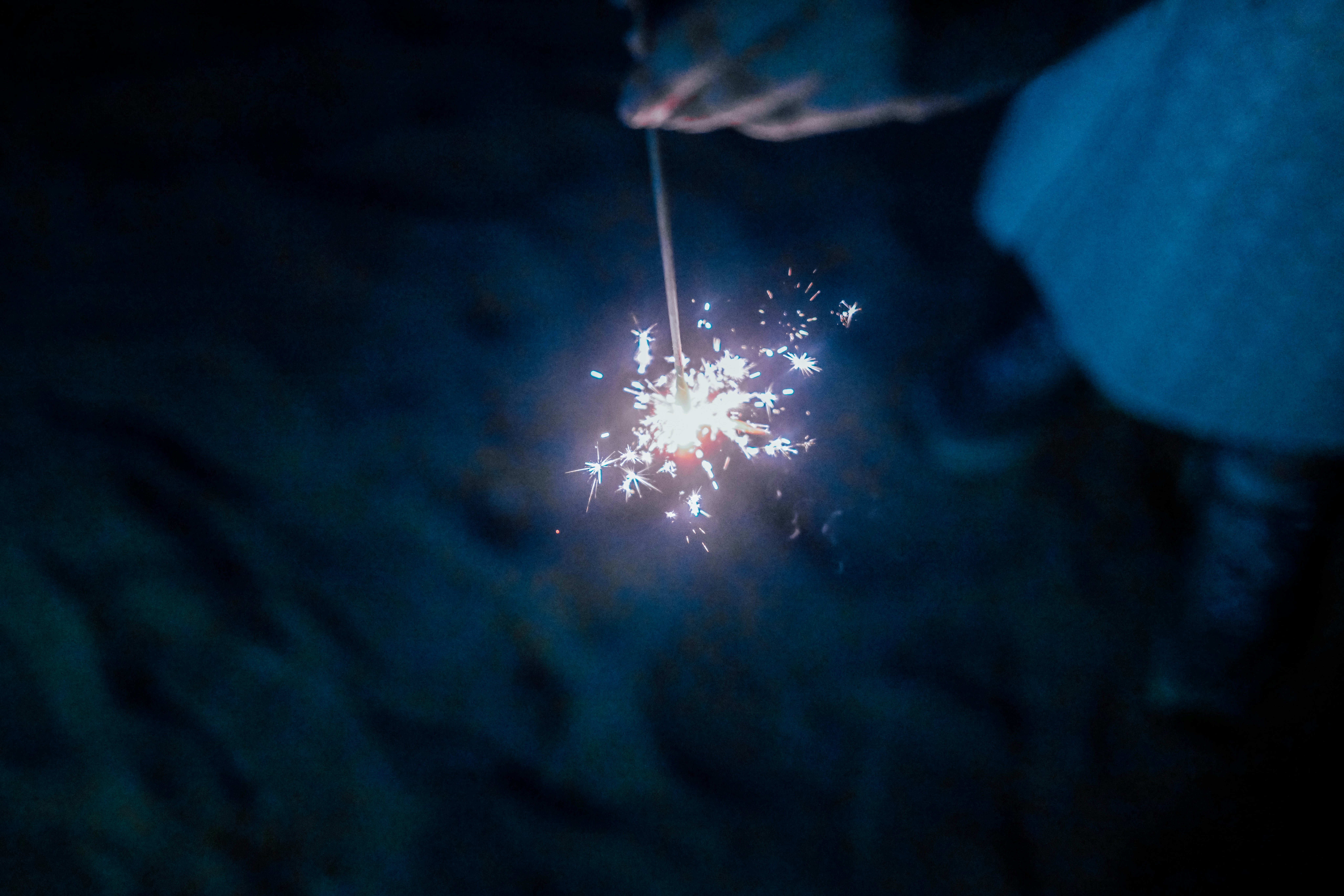 A welding moment with sparks flying in a dark workspace