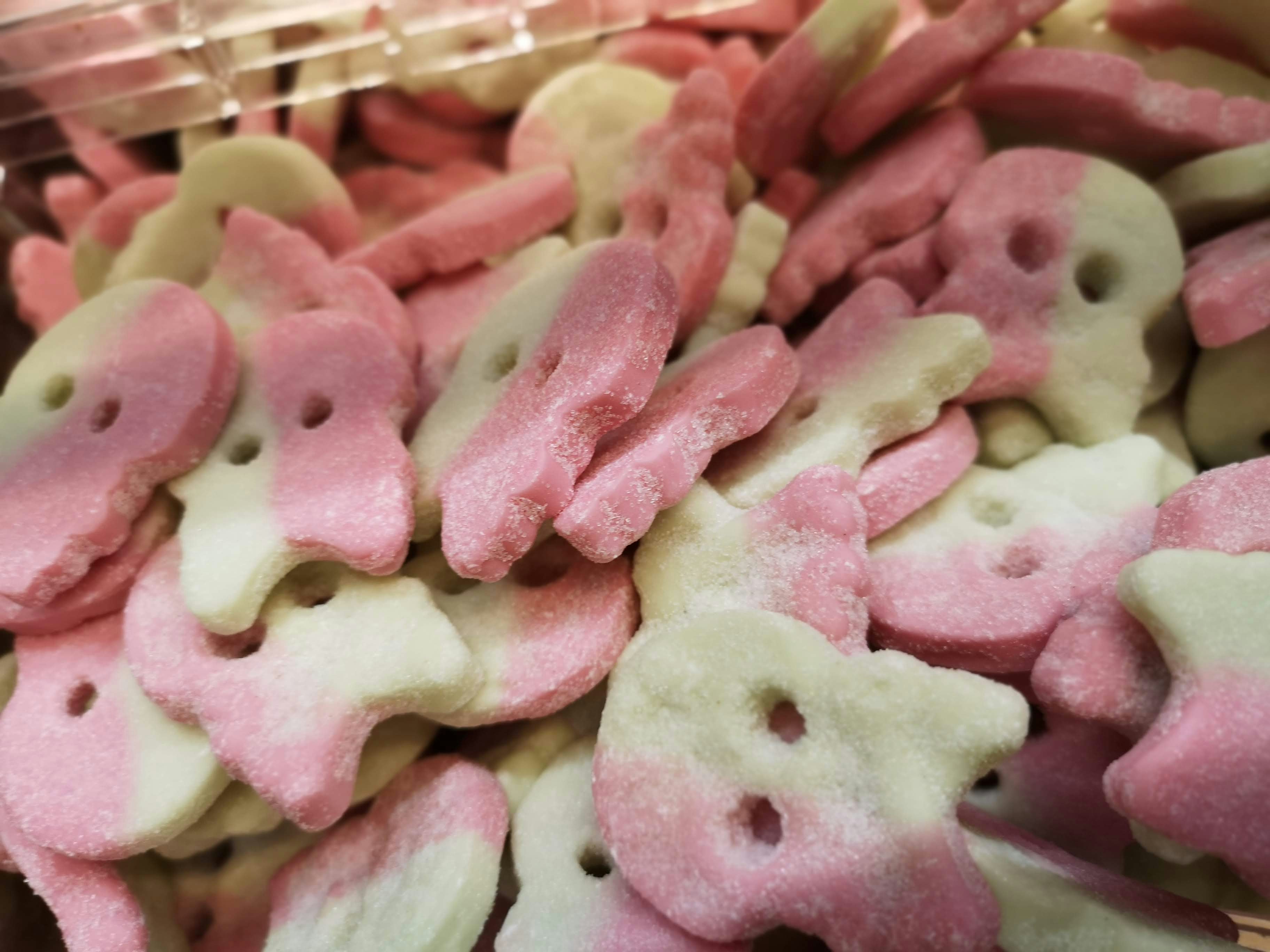 close-up of pink and white star-shaped candies