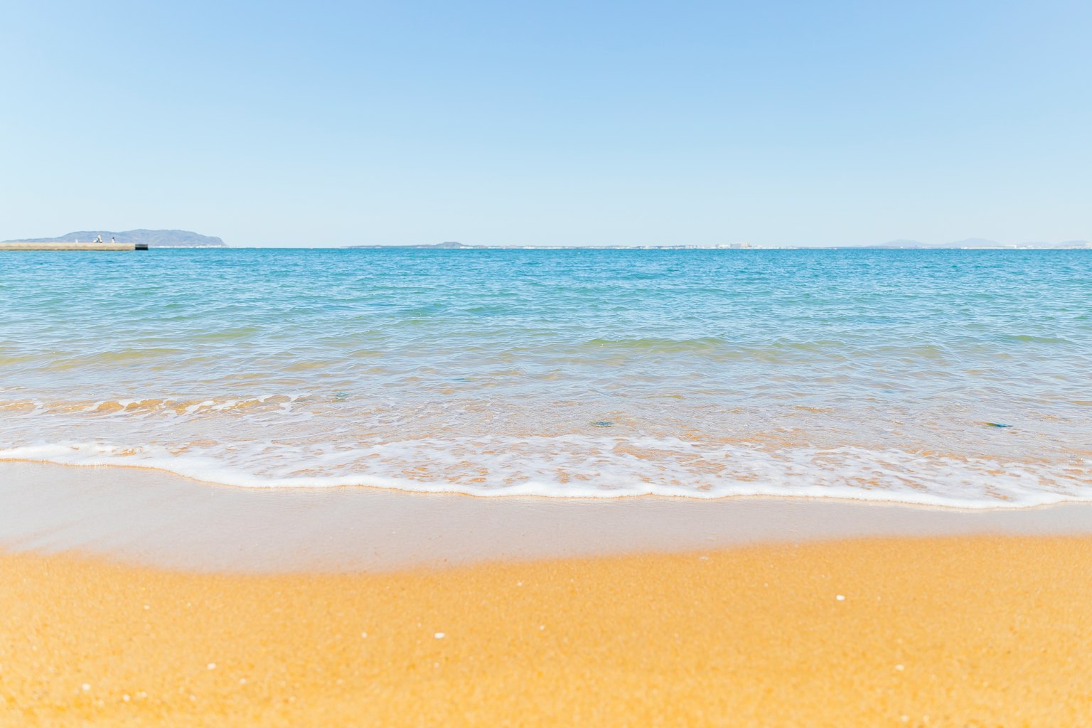 Calm sea with sandy beach landscape