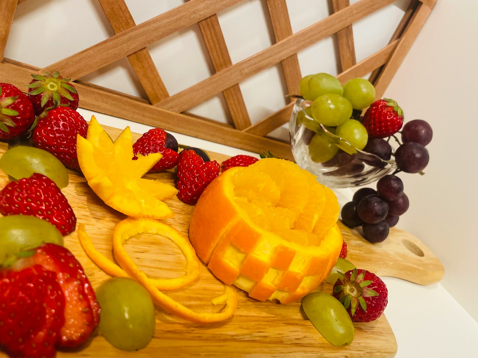 Colorful fruit arrangement with beautifully cut mango