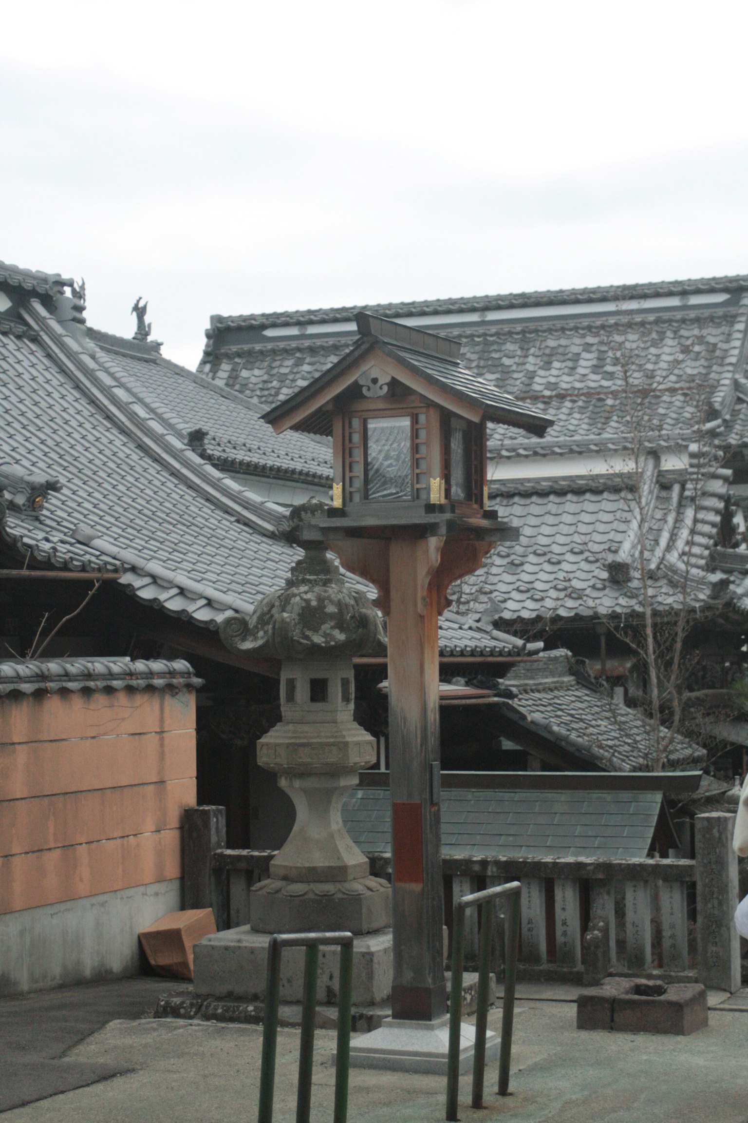 Traditional Japanese architecture with a stone lantern